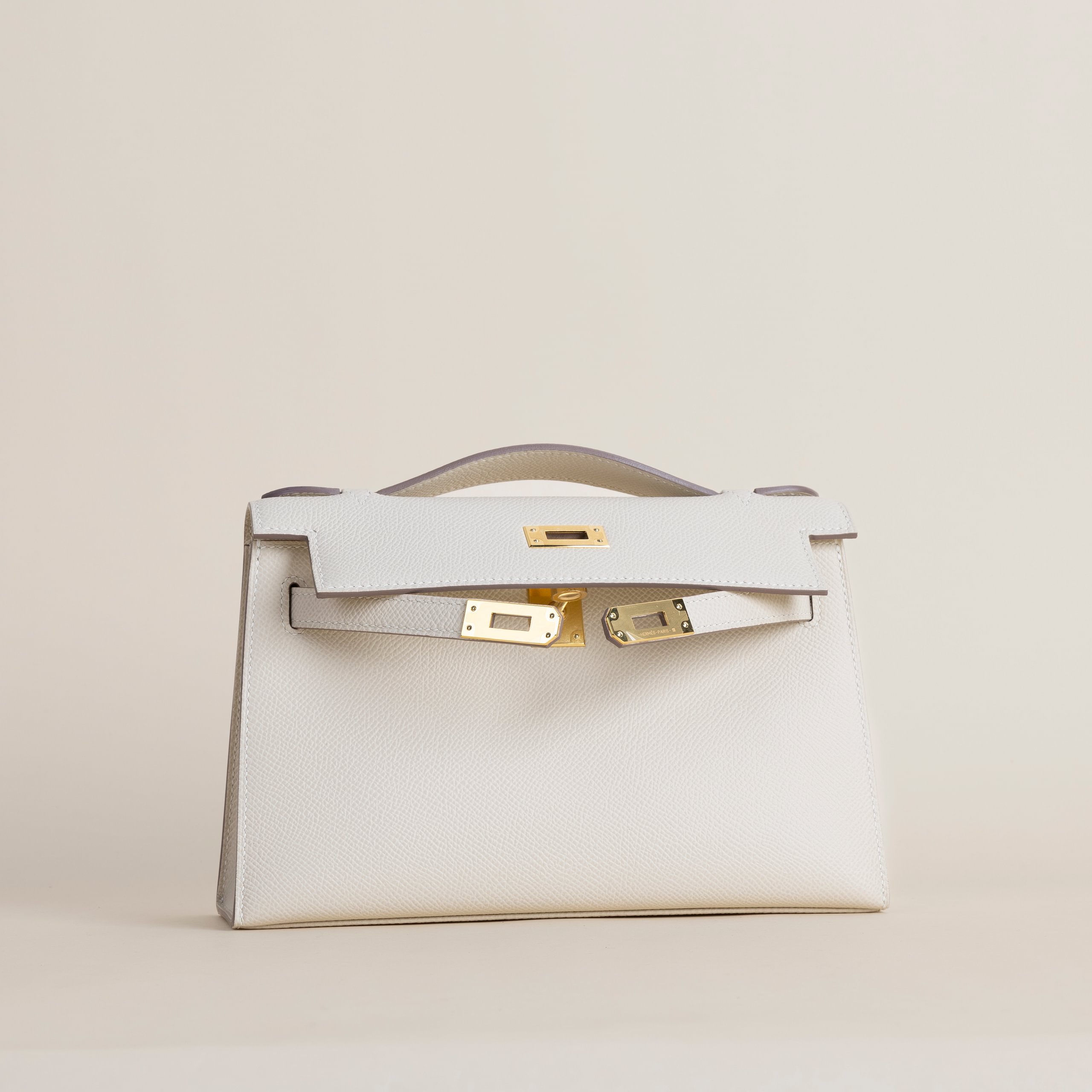 Kelly pochette epsom craie GHW