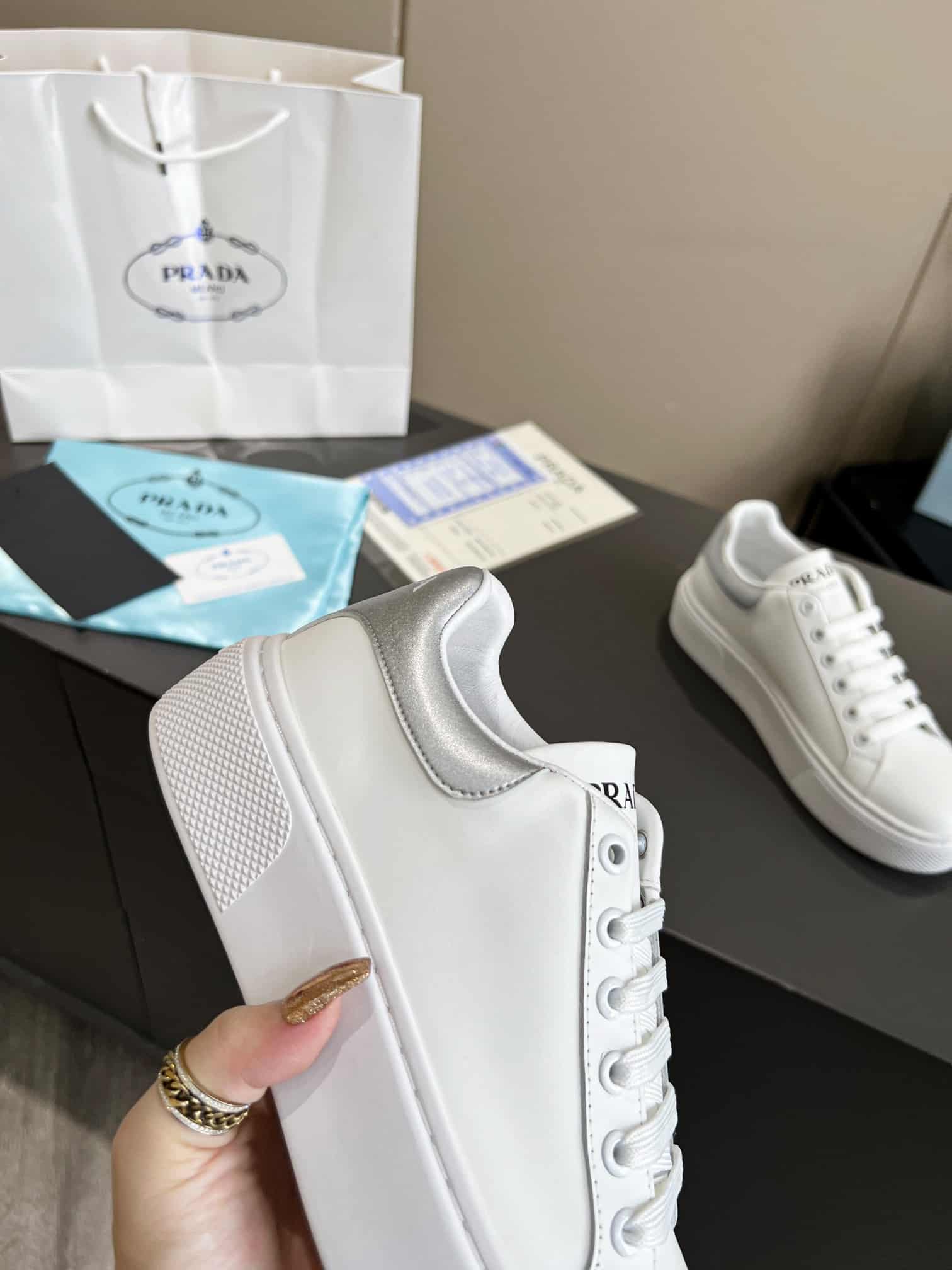 Prada Sneaker In White Leather With Silver Logo