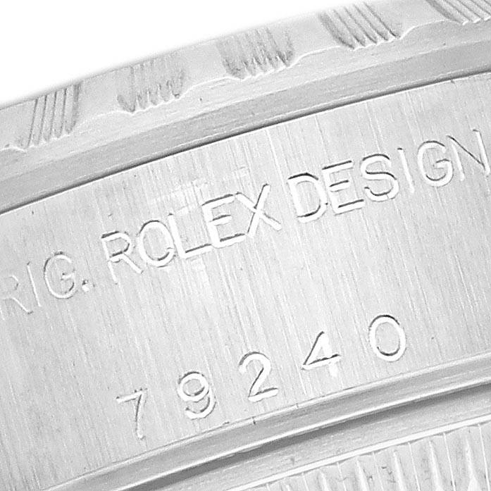 Rolex Date Salmon Dial Engine Turned Bezel Steel Ladies Watch 79240