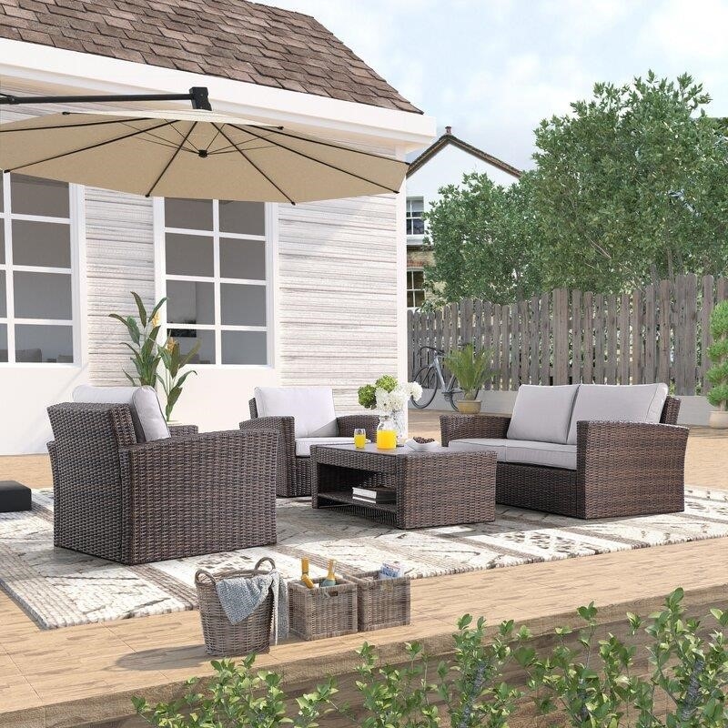 Emlee Wicker/Rattan 4 - Person Seating Group with Cushions