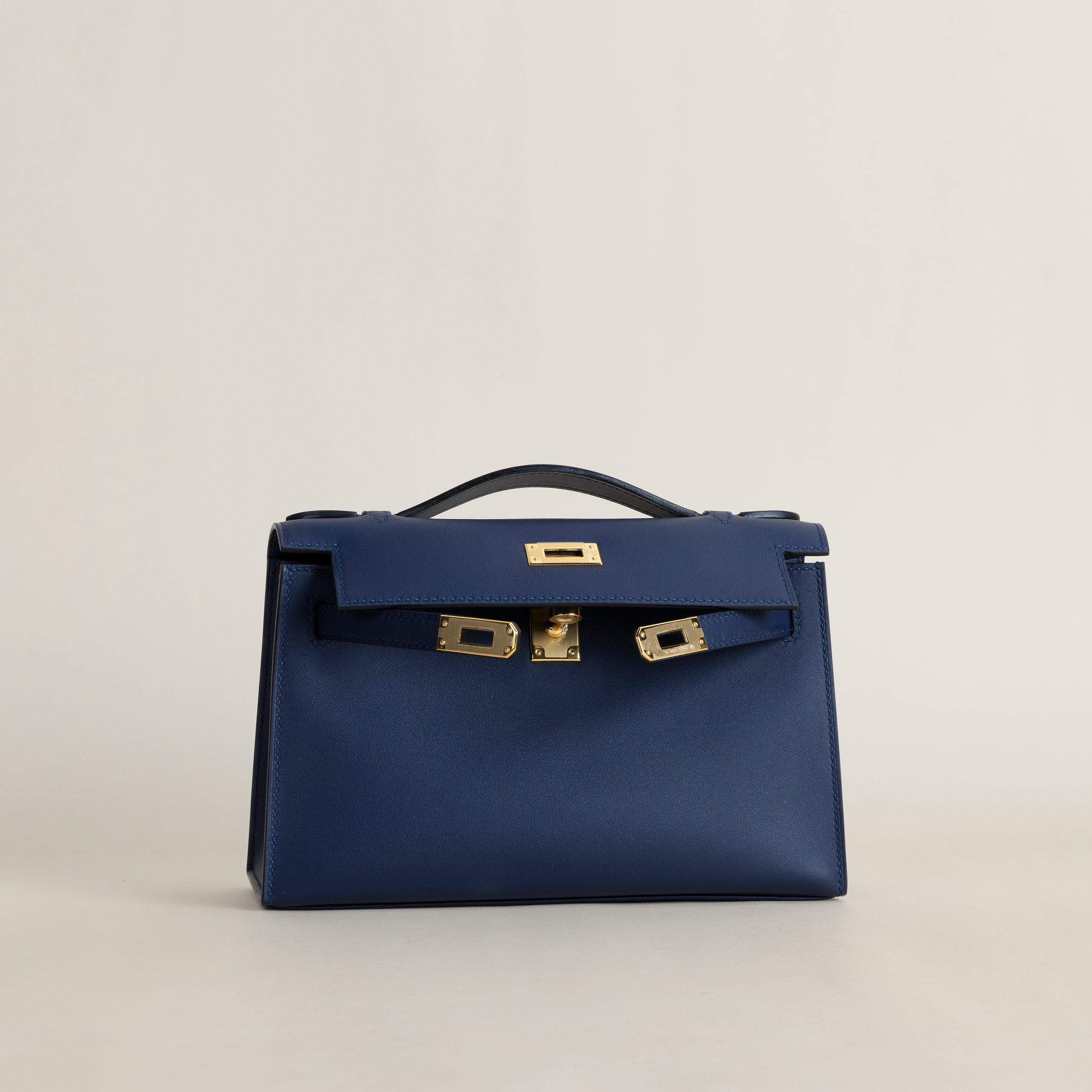 Kelly pochette swift blue saphir GHW