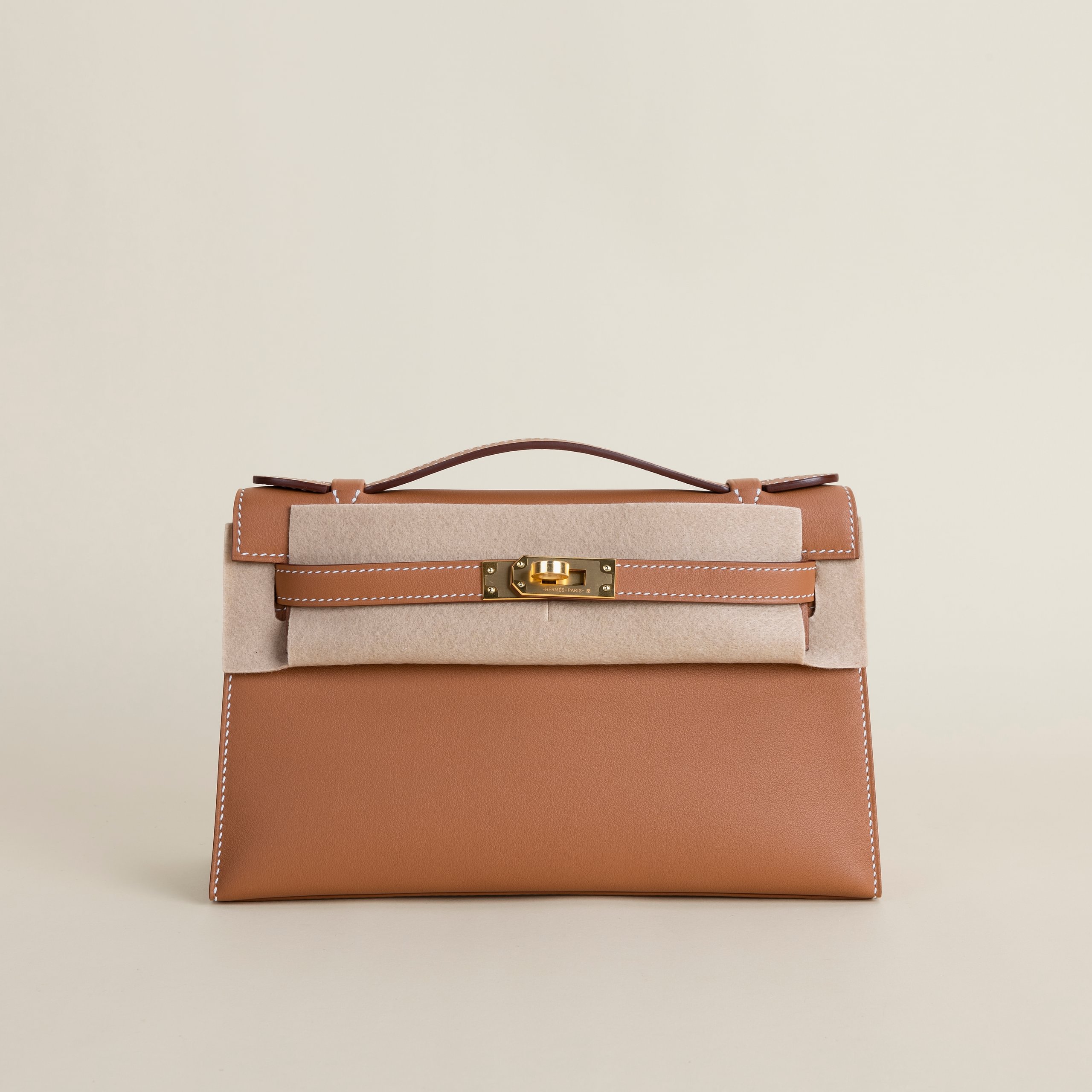 Kelly pochette swift gold GHW