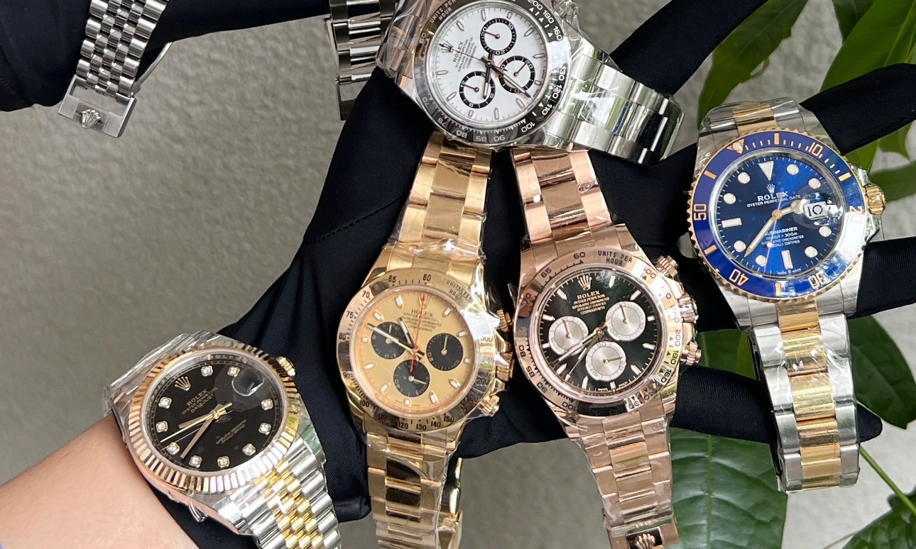 Side-by-side comparison of a classic replica Rolex and a modern Rolex super clone watch, showing sapphire crystal, moissanite bezel, and upgraded movement craftsmanship.