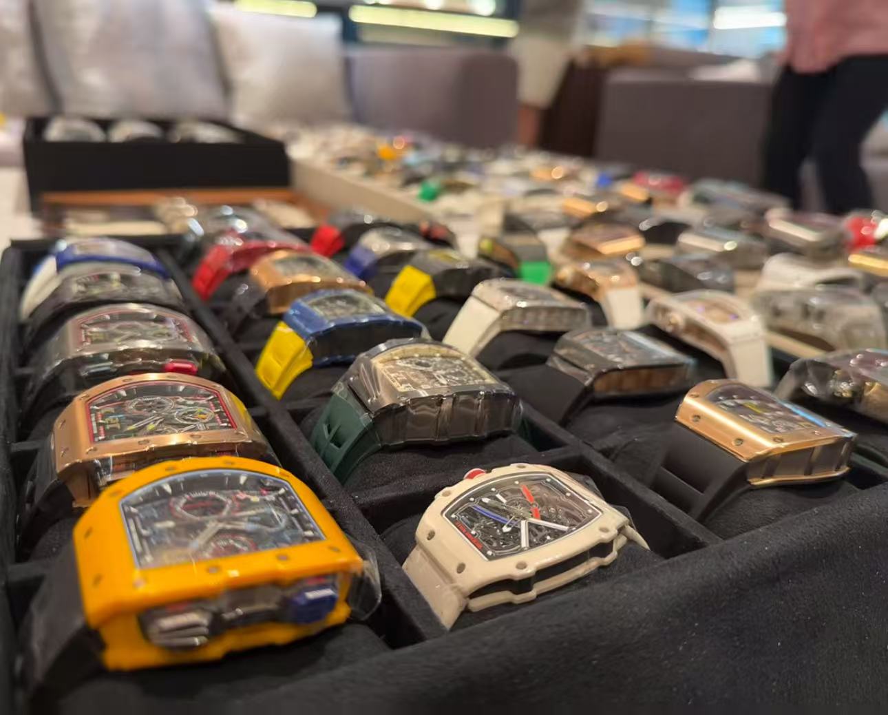 Group shot of assorted Richard Mille replica watches highlighting differences in case materials and dial colors