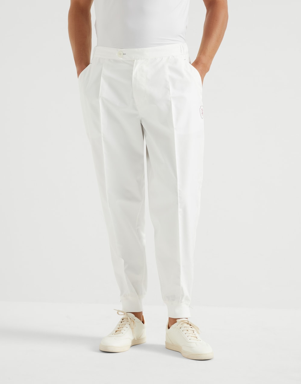 Nylon trousers with tabbed waistband, Crête detail and elasticated zipper cuffs