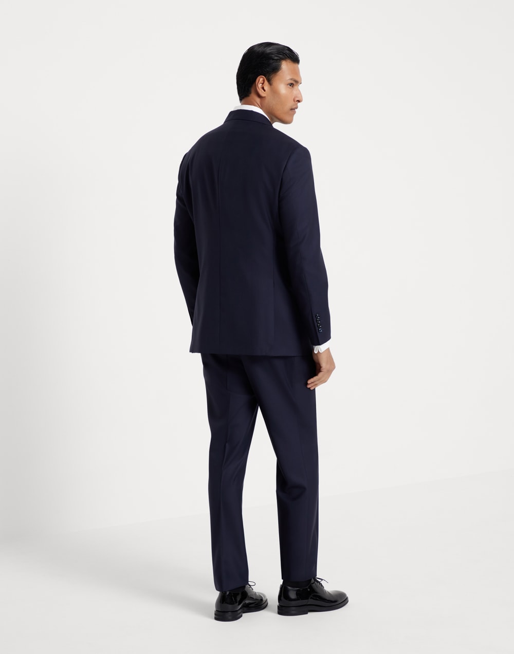 Lightweight virgin wool and silk twill tuxedo with one-and-a-half breasted jacket and double-pleated trousers