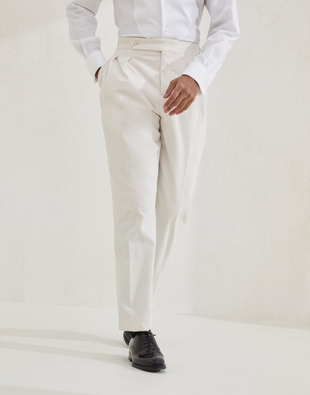 Sea Island cotton narrow wale corduroy tuxedo trousers with double pleats and waist tabs