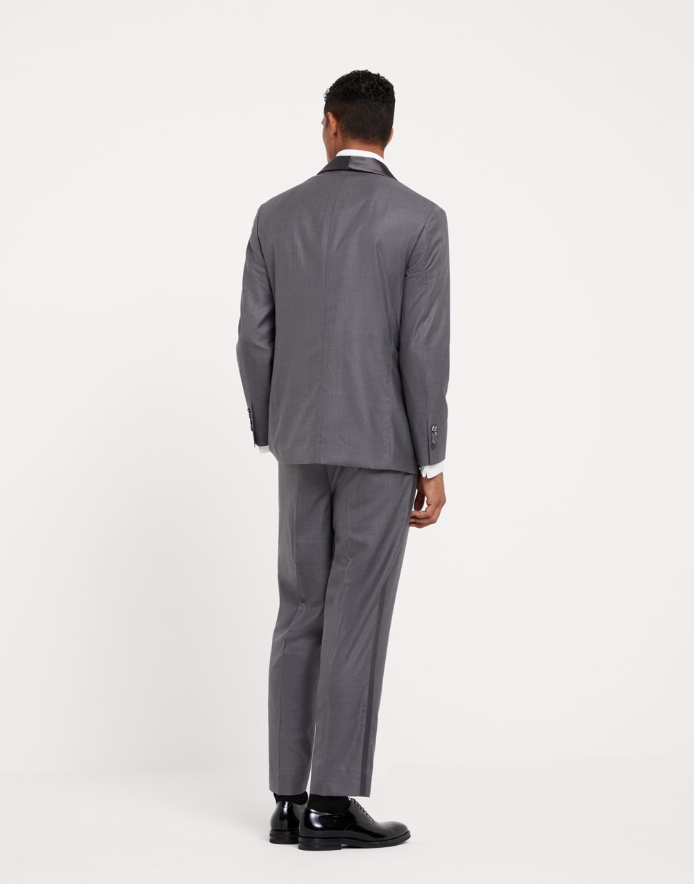 Lightweight virgin wool and silk twill tuxedo with shawl lapel jacket and pleated trousers