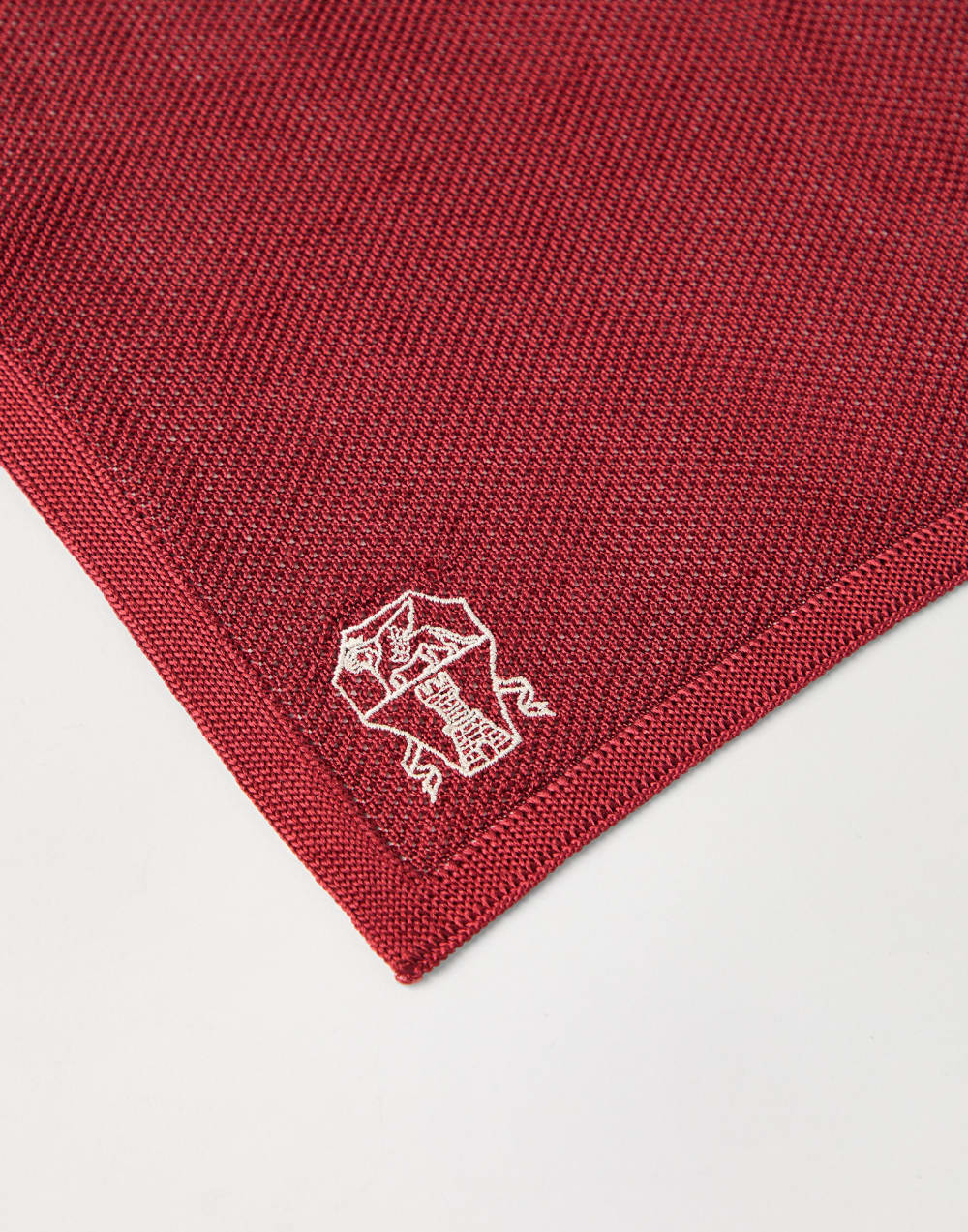 Silk knit pocket square with embroidered logo