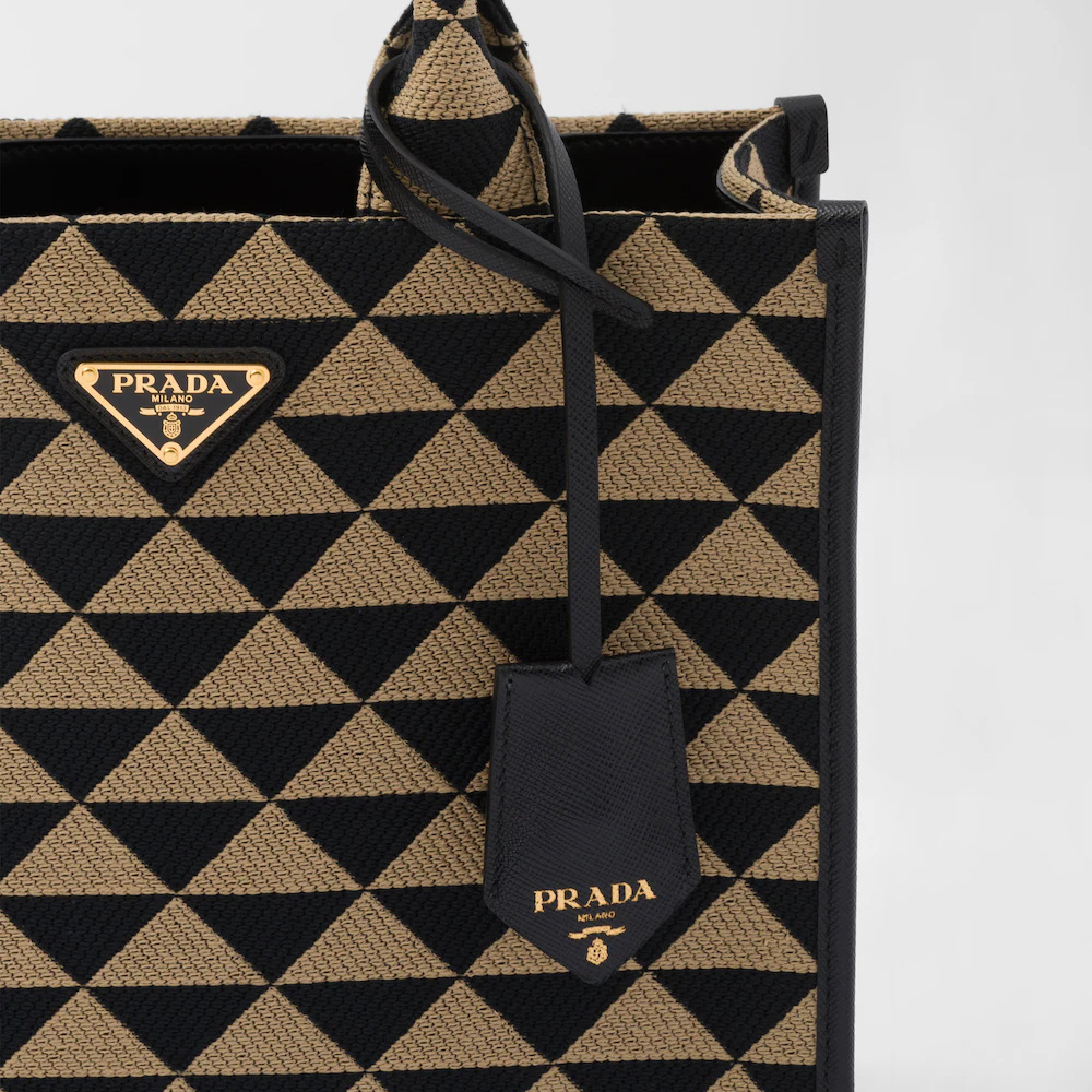 Small  Symbole embroidered fabric handbag