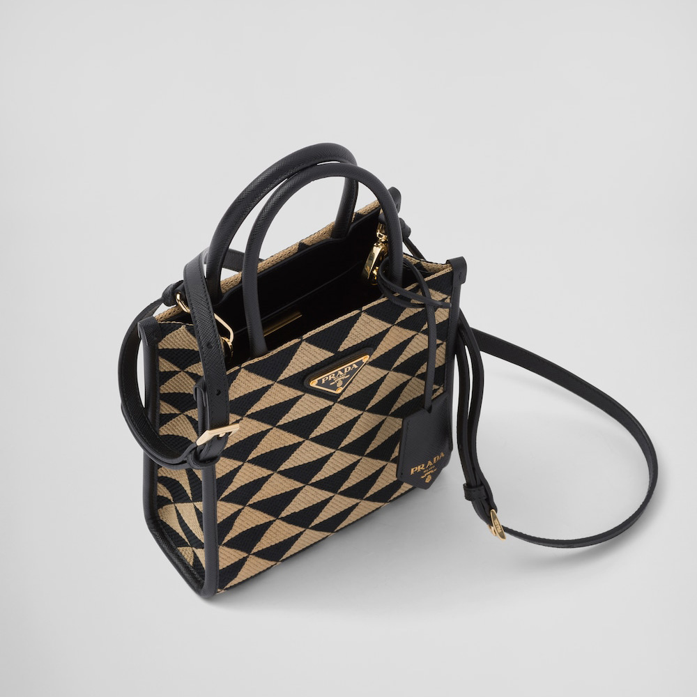 Symbole embroidered fabric mini bag