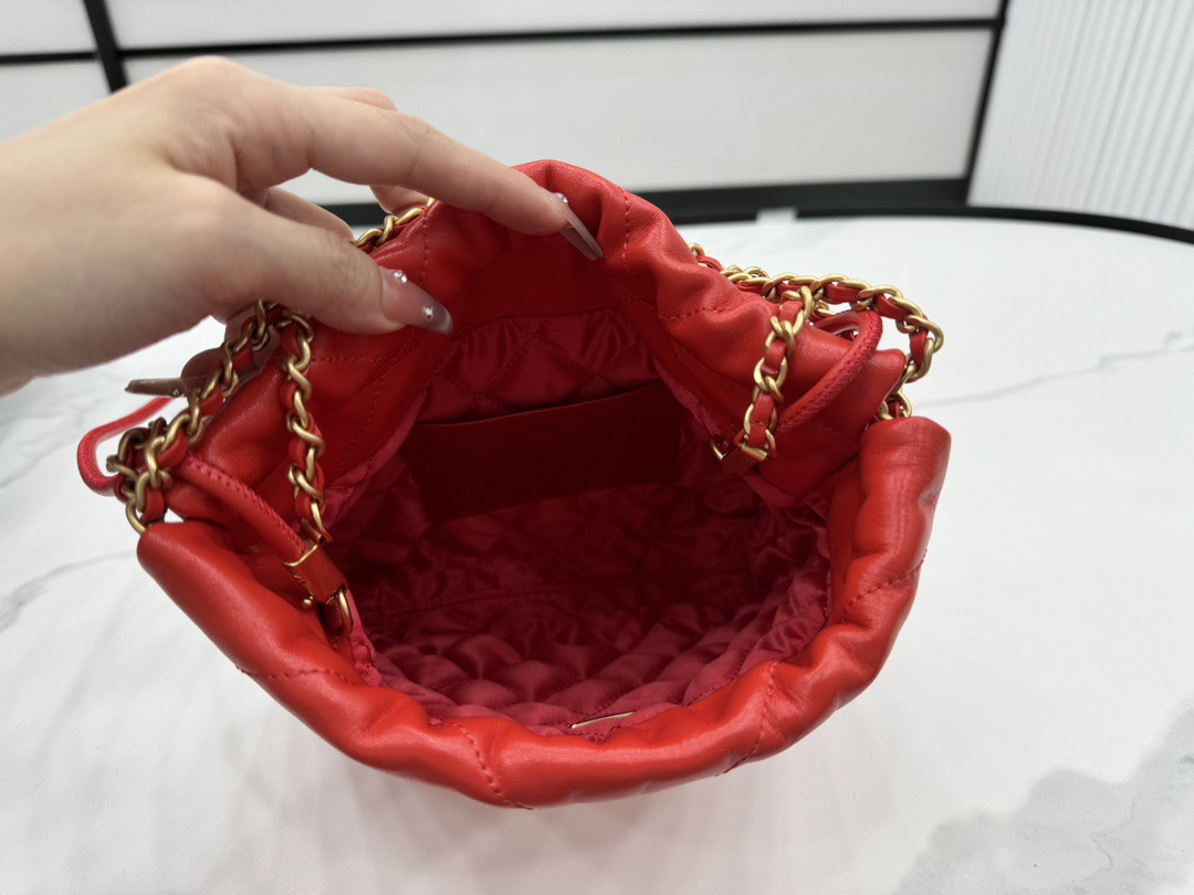 CHANEL CHANEL 22 Mini Handbag Shiny Calfskin, Imitation Pearls & Gold-Tone Metal Red- AS3980
