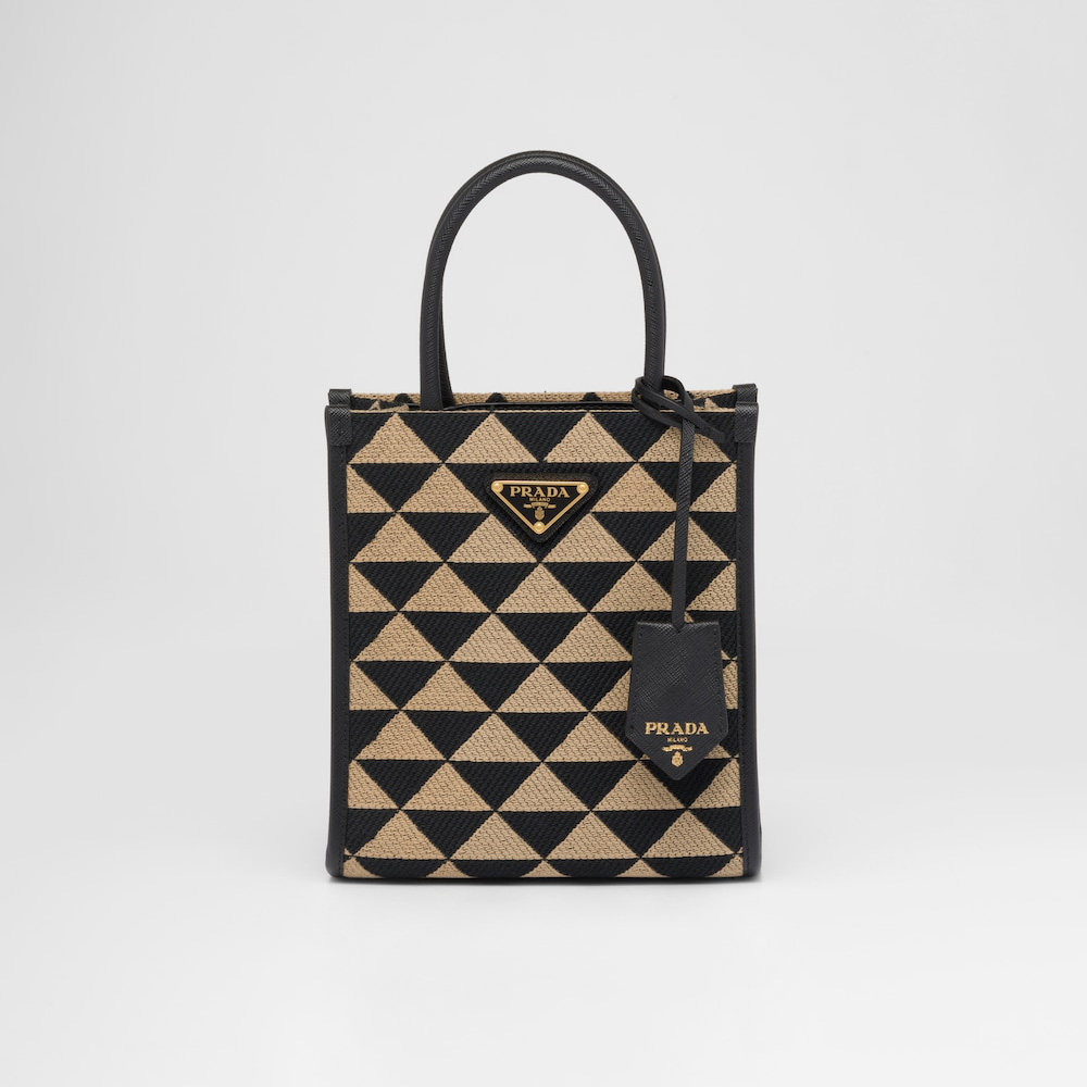 Symbole embroidered fabric mini bag