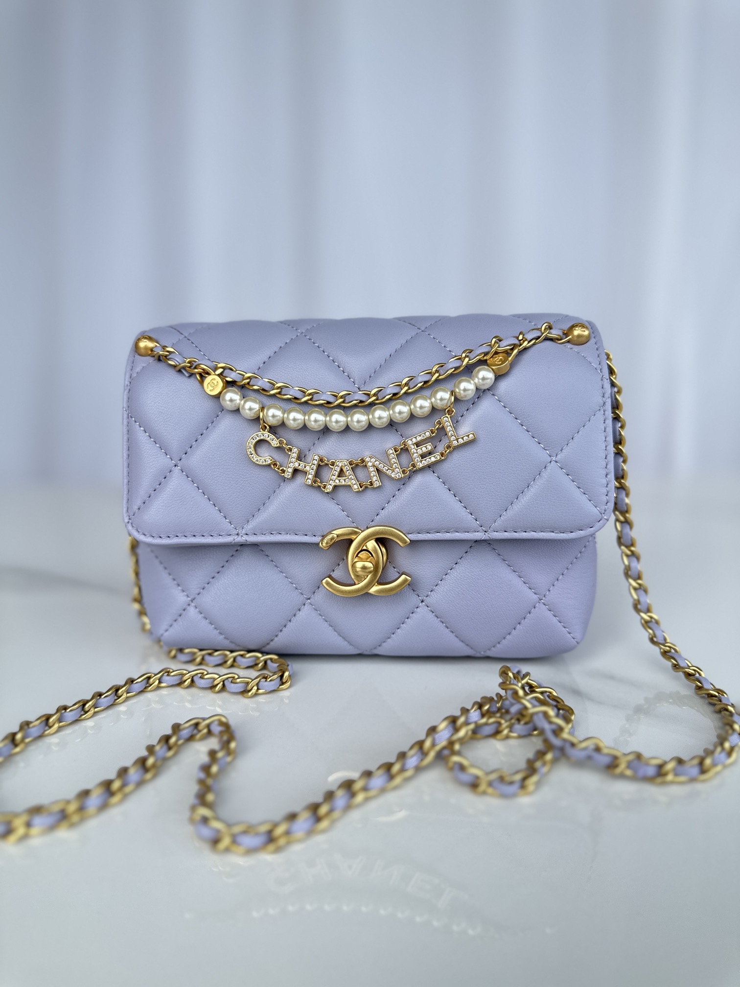 CHANEL Mini flap bag Shiny lambskin, faux pearls and gold coloured metal light purple-AS4986