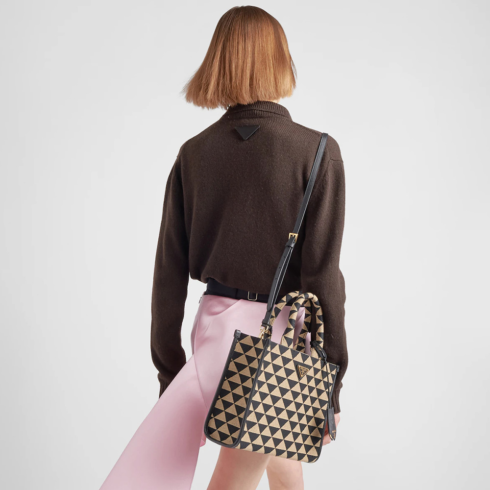 Small  Symbole embroidered fabric handbag