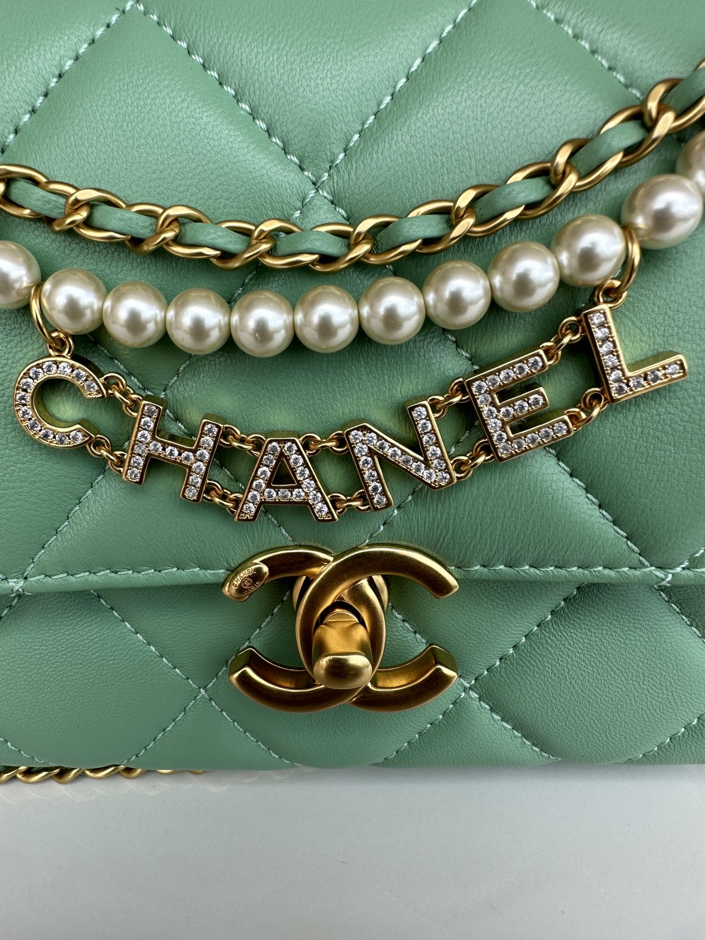 CHANEL Mini flap bag Shiny lambskin, faux pearls and gold coloured metal Green-AS4986