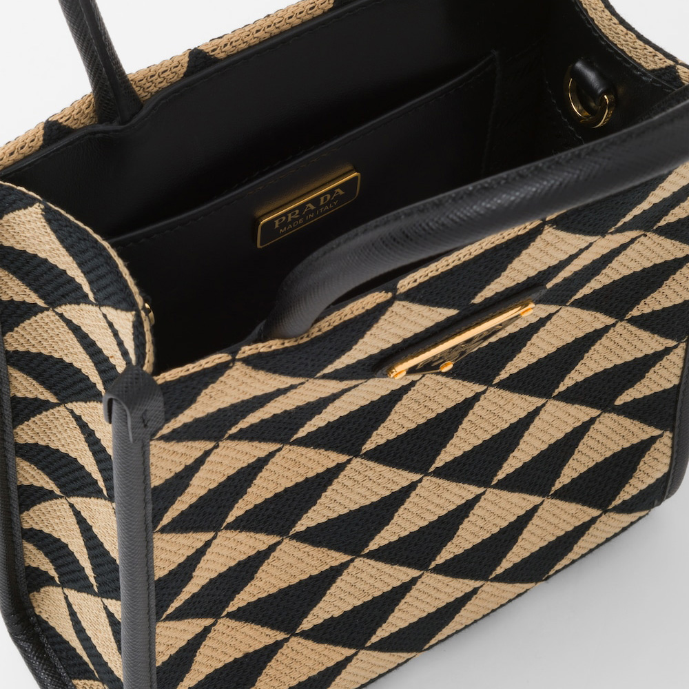 Symbole embroidered fabric mini bag