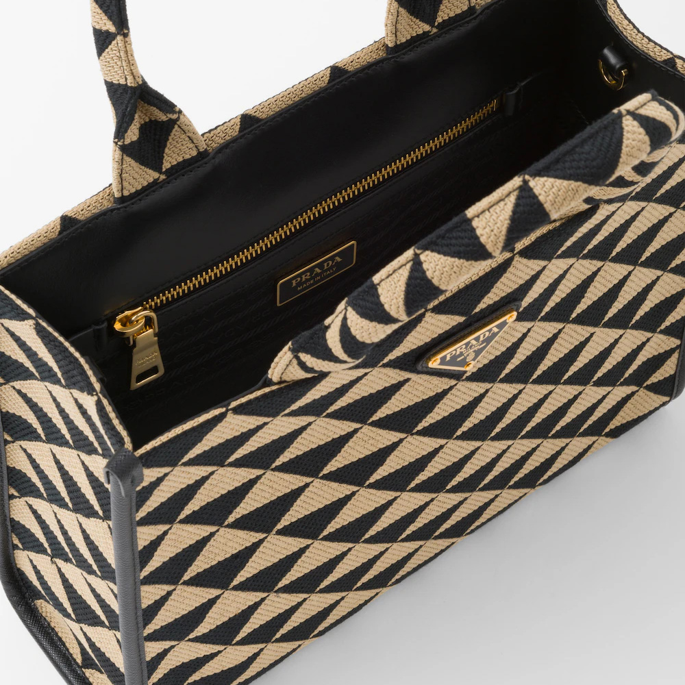 Small  Symbole embroidered fabric handbag