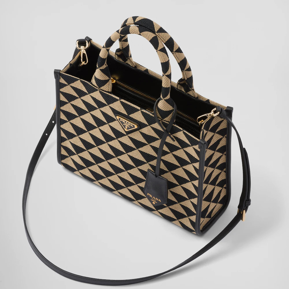 Small  Symbole embroidered fabric handbag