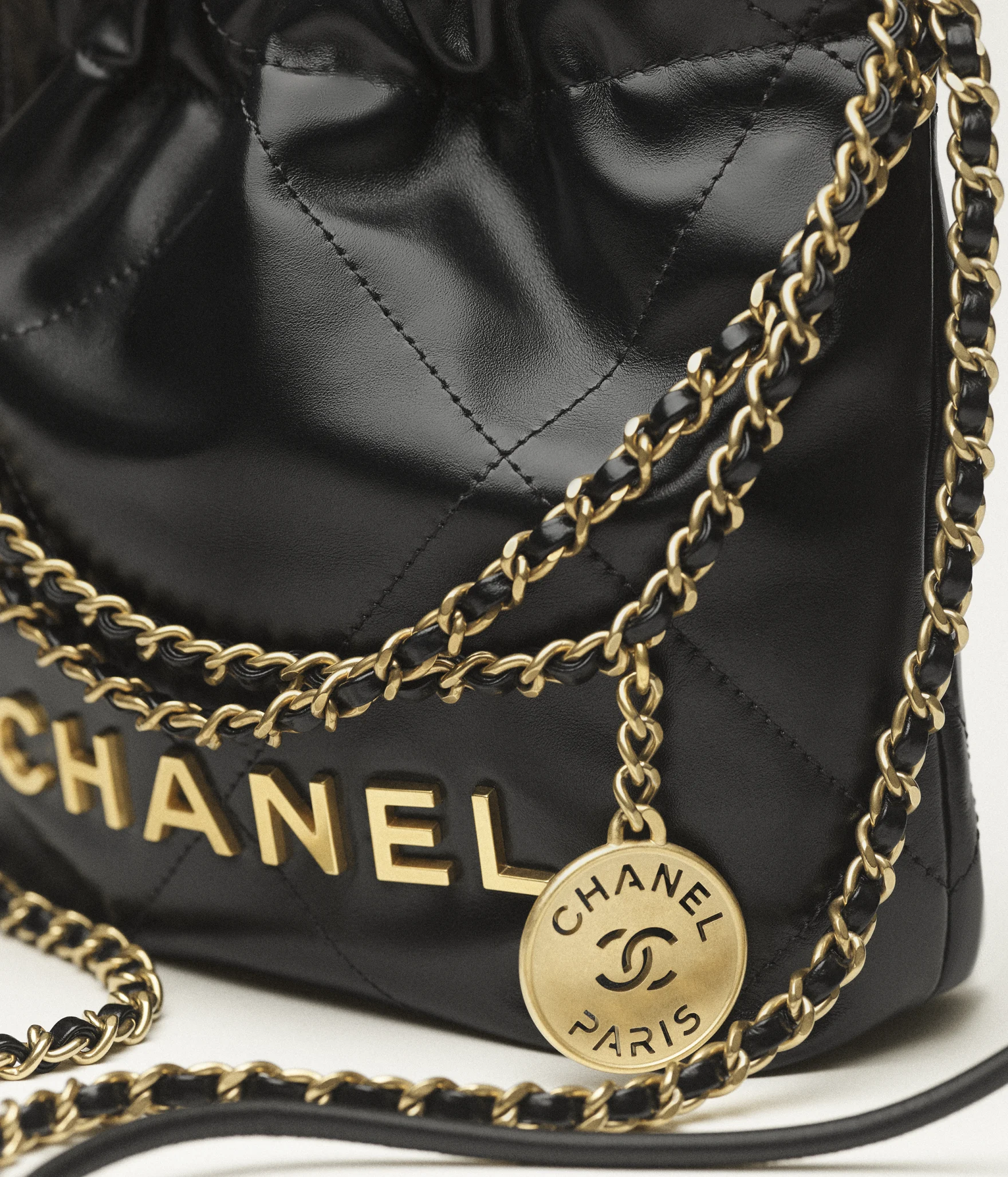 CHANEL 22 Mini Handbag Shiny Calfskin & Gold-Tone Metal Black AS3980