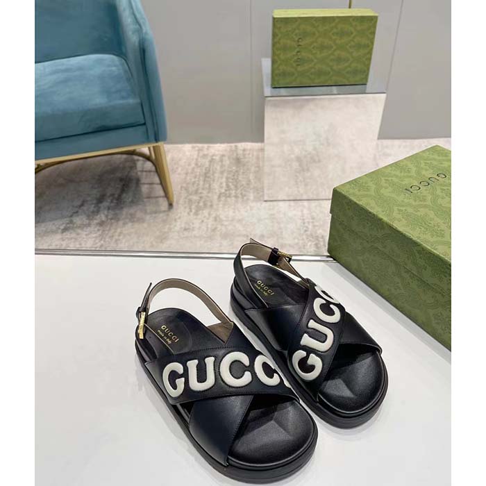 Gucci Unisex GG Sandal Black White Leather Script Rubber Buckle Flat