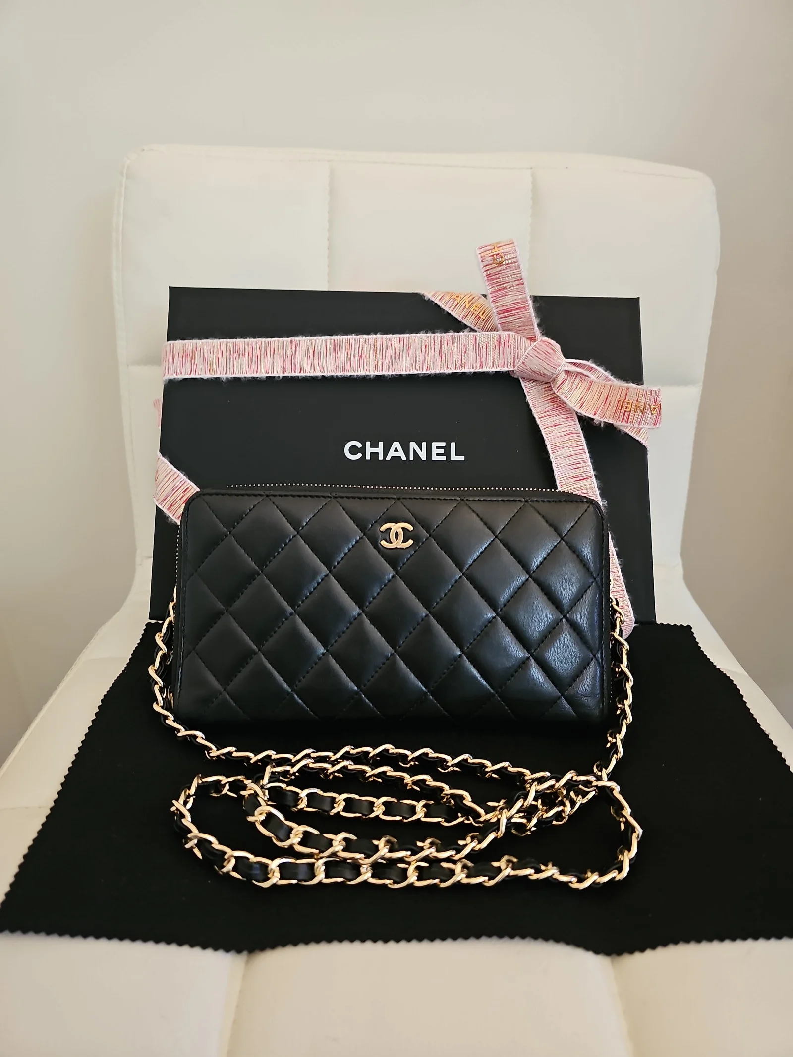 CHANEL Black Lambskin Quilted Zip Around Wallet