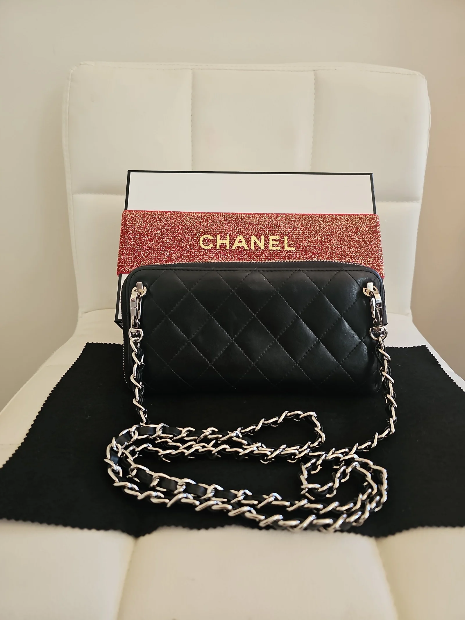 CHANEL Black Lambskin Quilted Zip Around Wallet