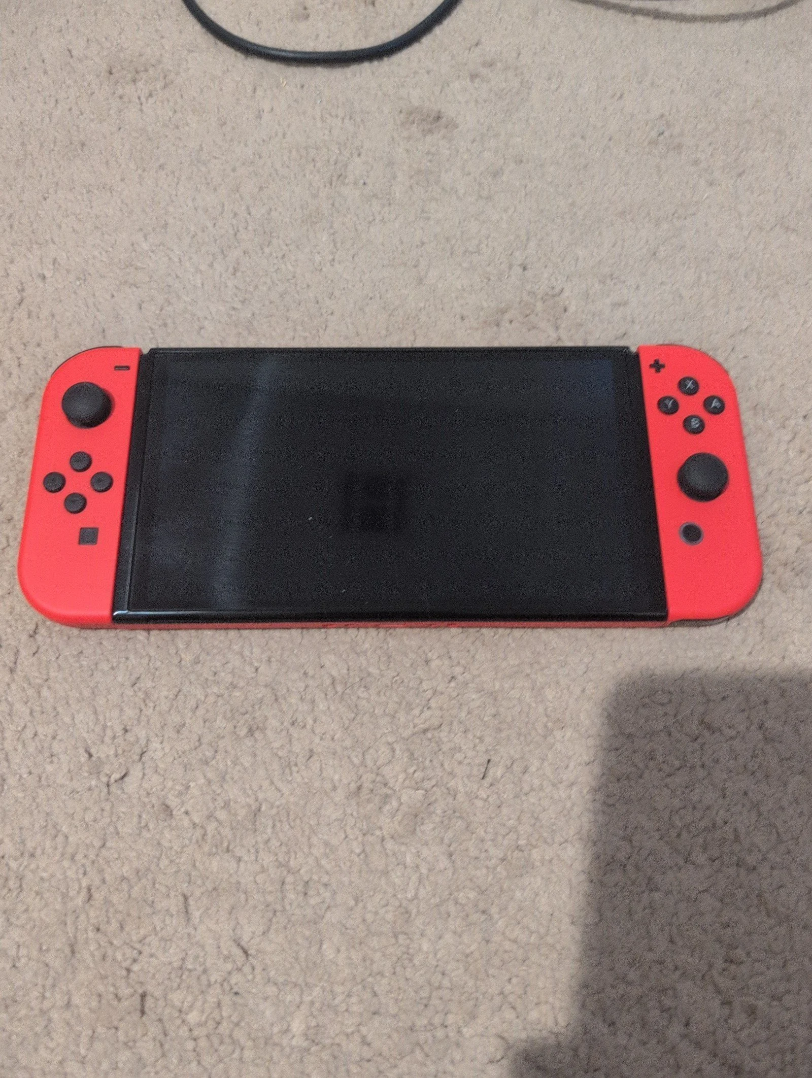 Nintendo switch oled mario edition 7L72