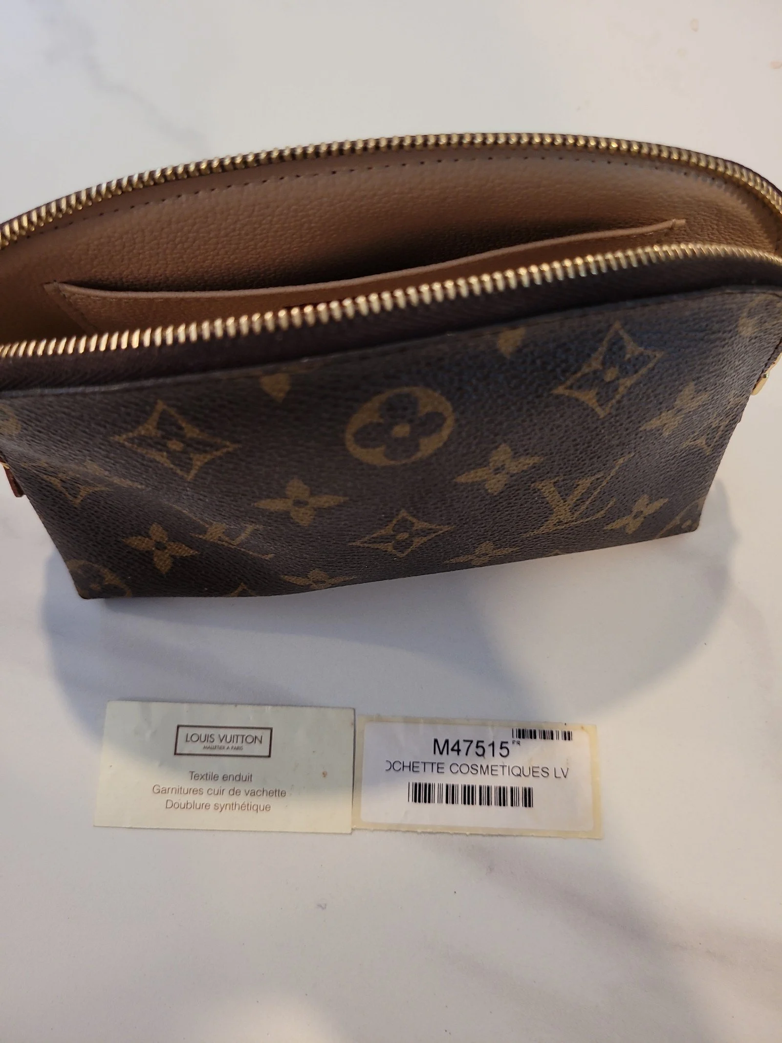 Louis Vuitton authentic cosmetic pouch FIRM