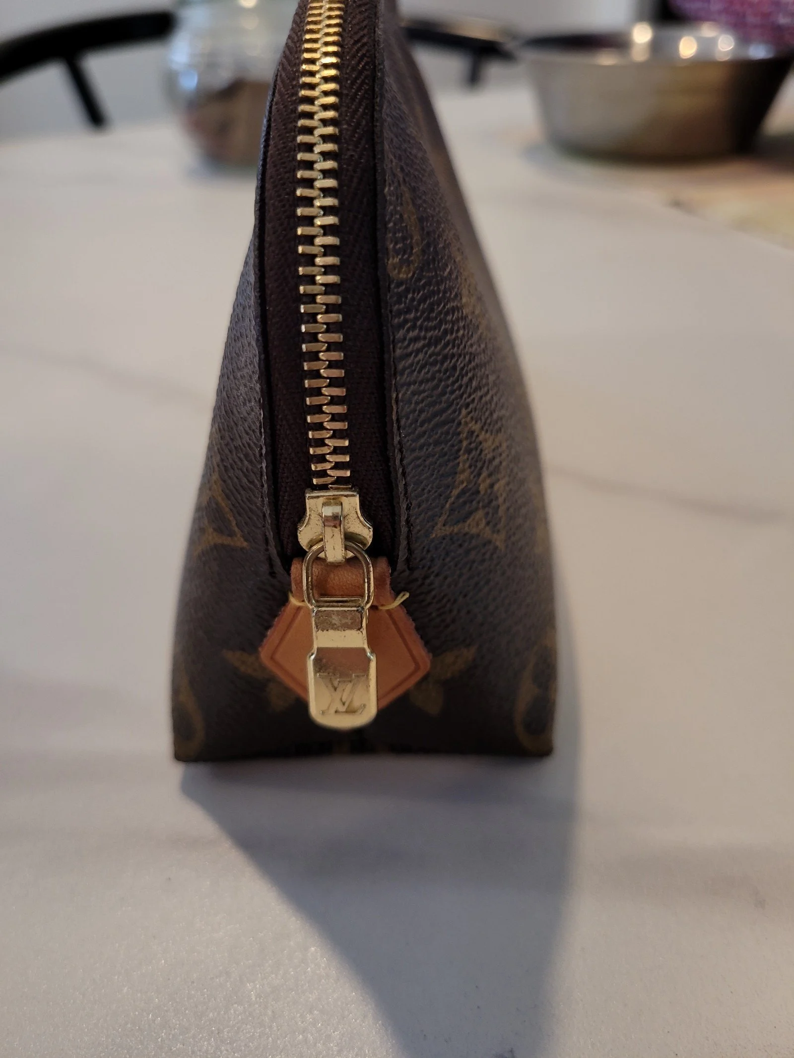 Louis Vuitton authentic cosmetic pouch FIRM