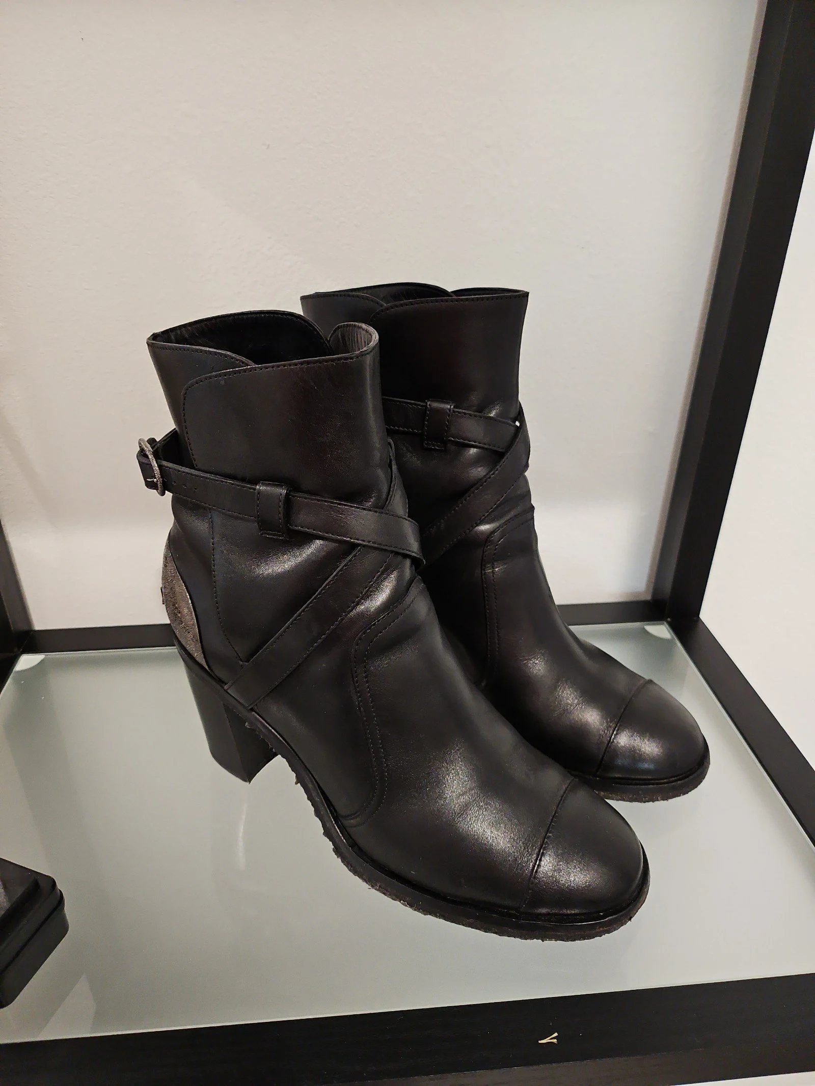 Chanel metal plaque runway boots