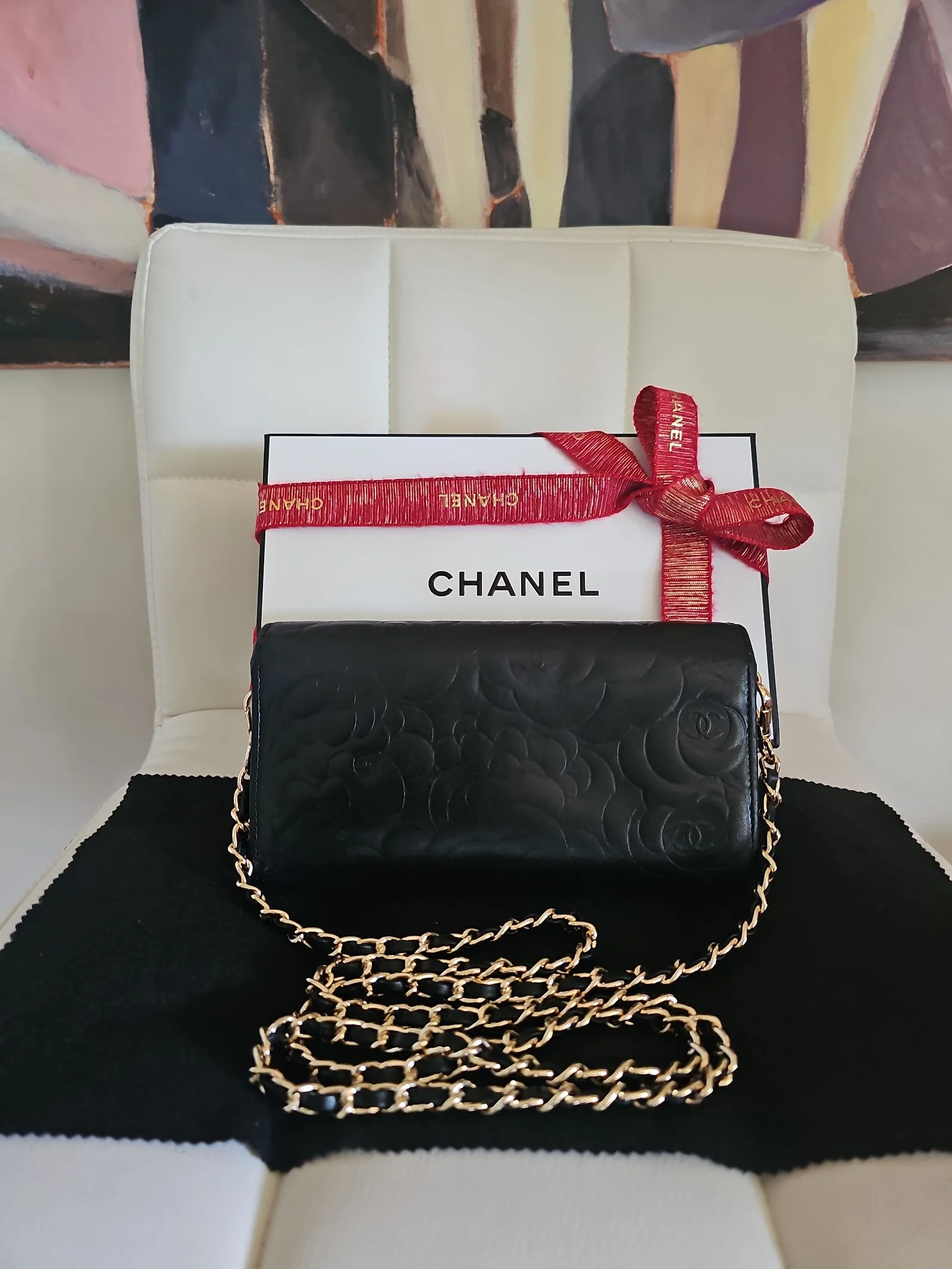CHANEL Black Lambskin Camellia Embossed Wallet