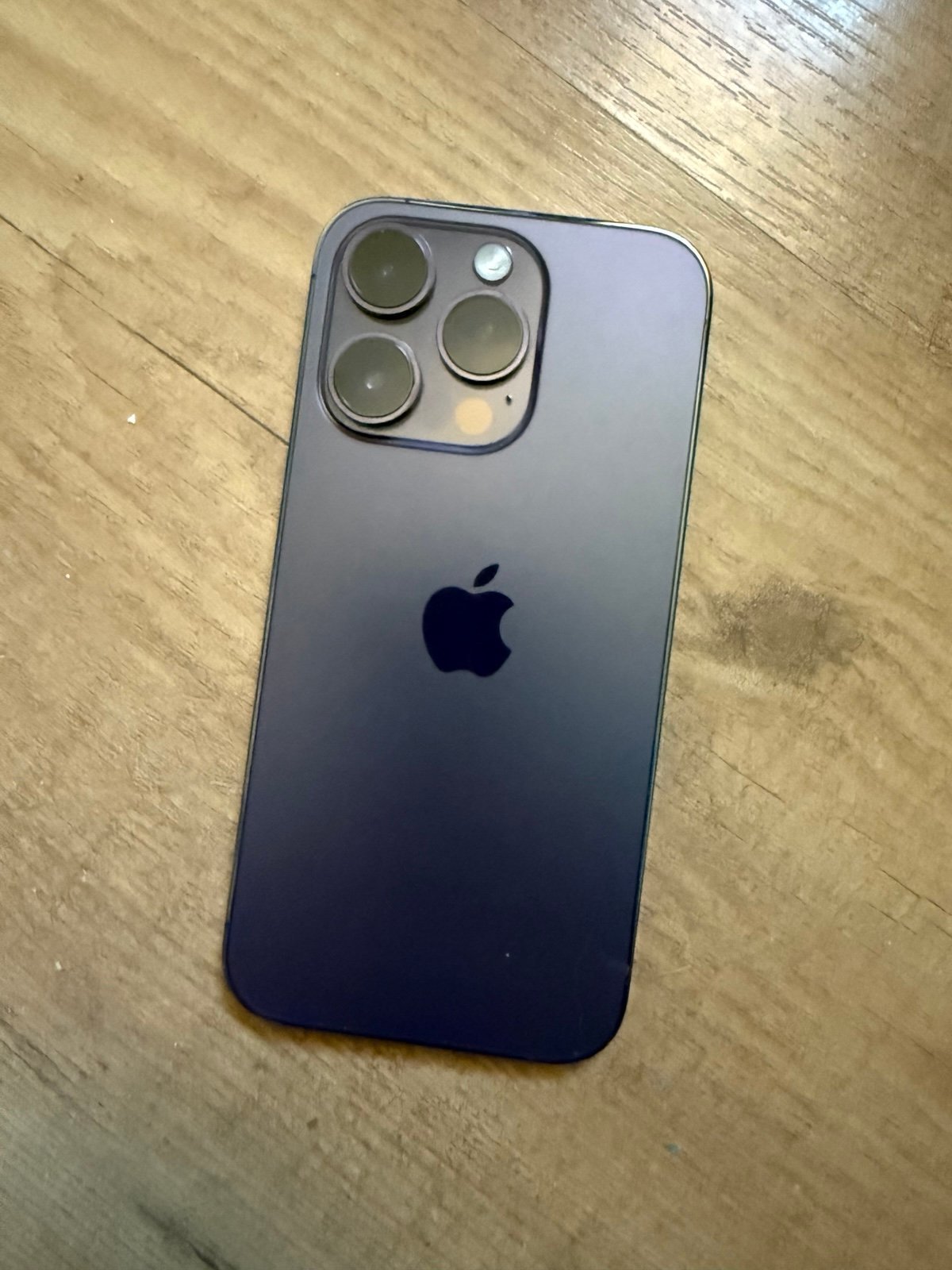 iPhone 14 Pro 256gb purple great condition plus 5 cases 3D53