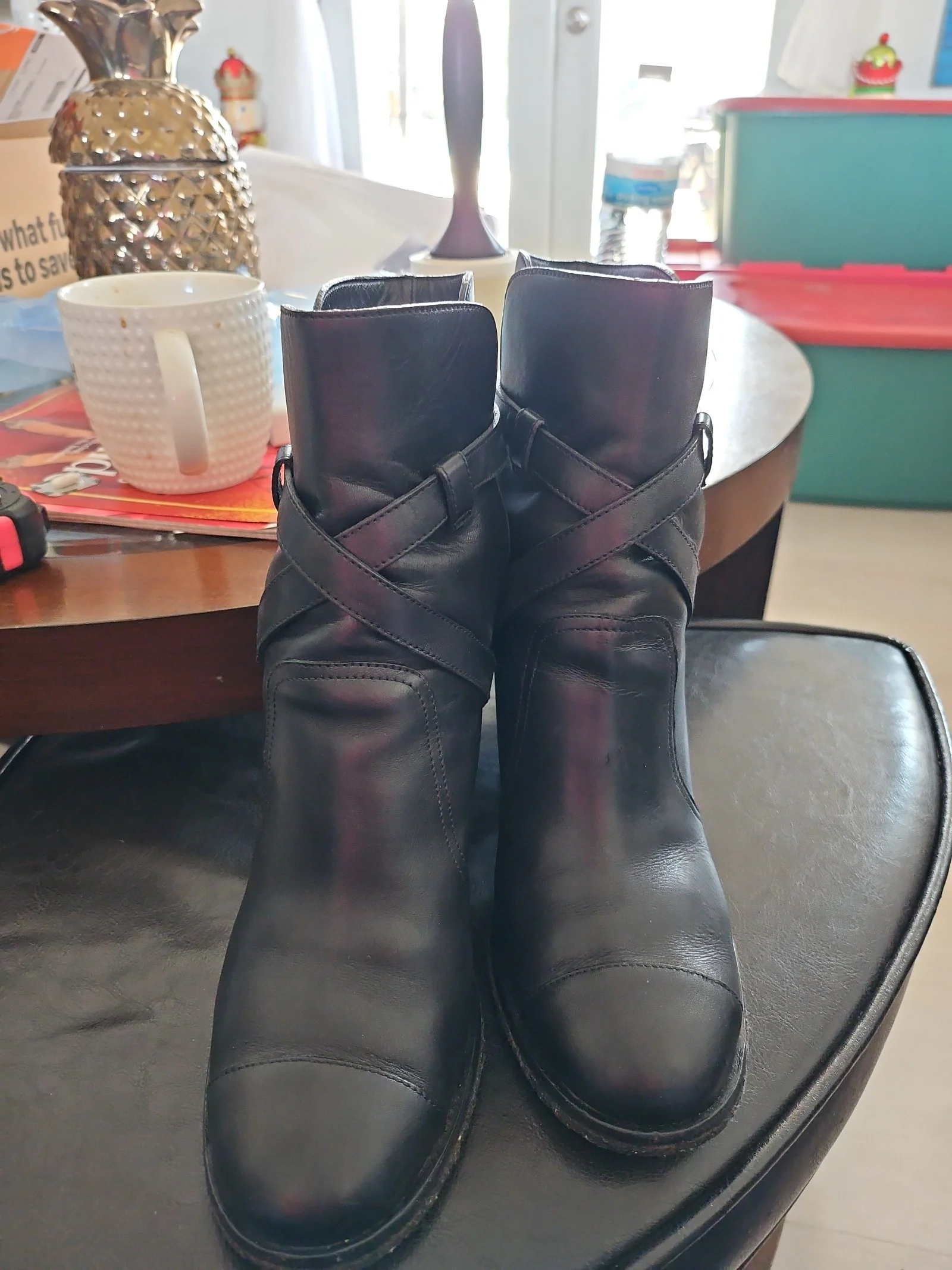 Chanel metal plaque runway boots