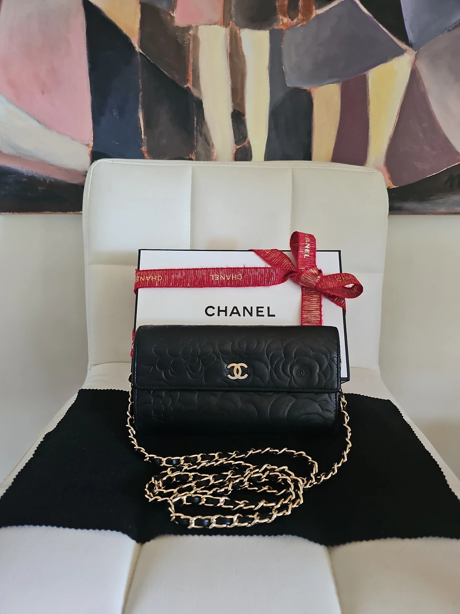 CHANEL Black Lambskin Camellia Embossed Wallet