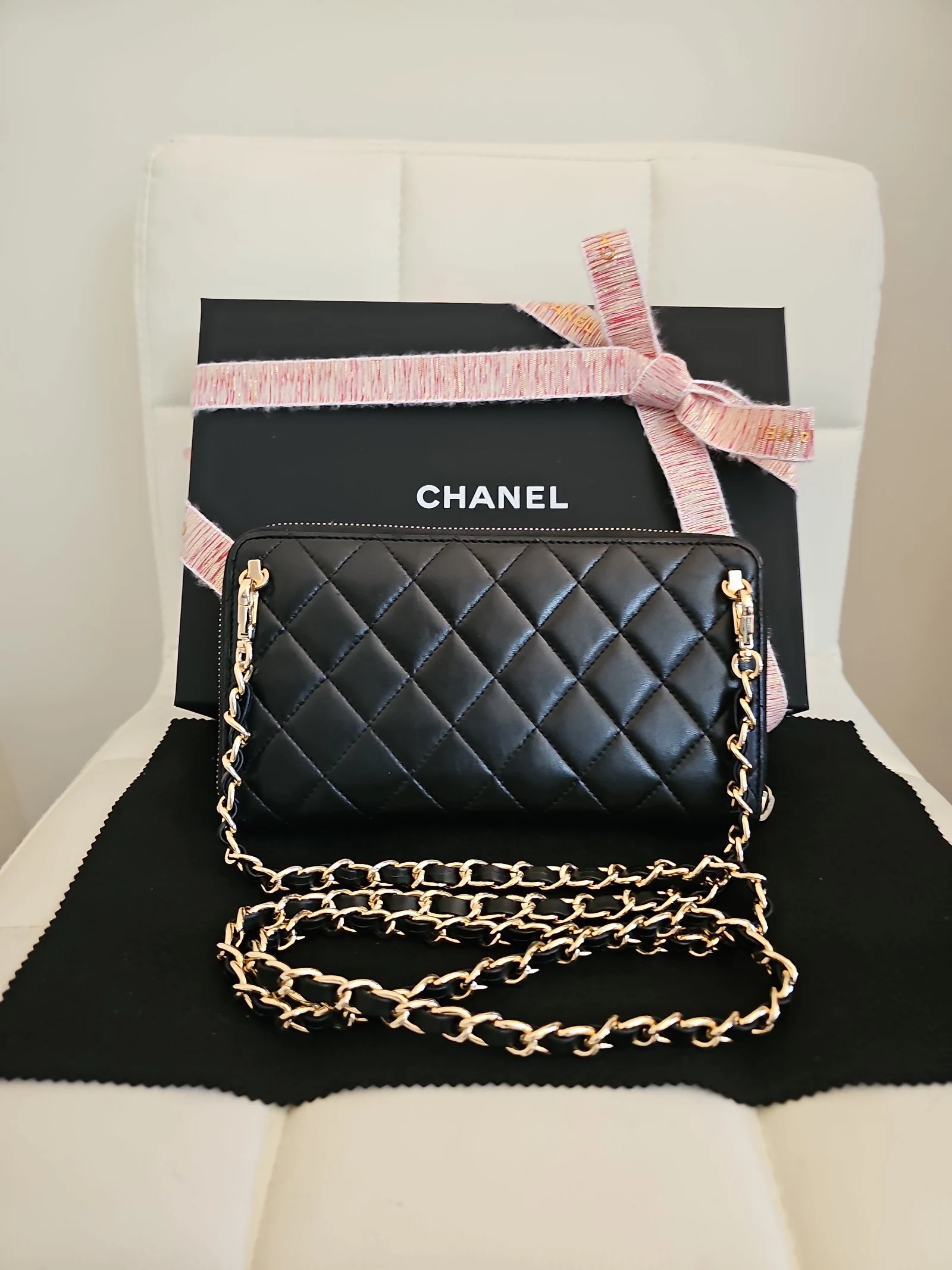 CHANEL Black Lambskin Quilted Zip Around Wallet