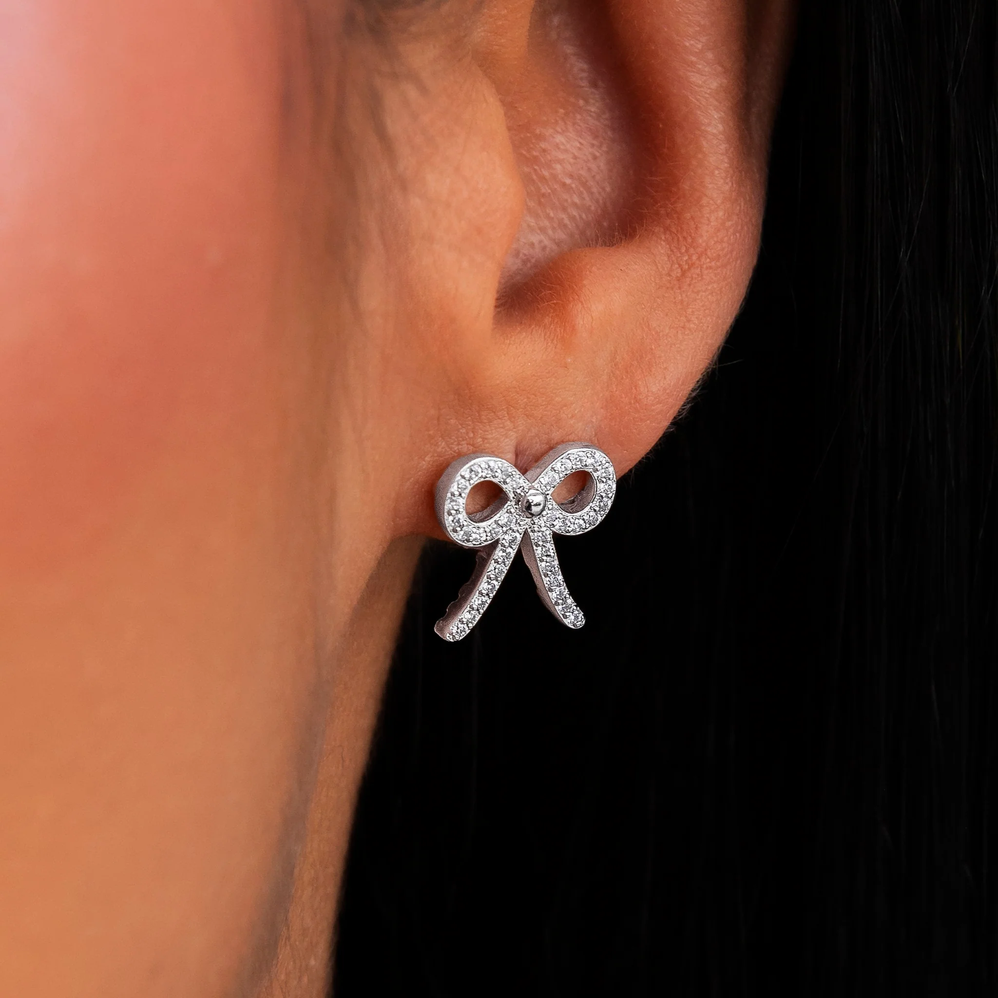 Diamond Bow Stud Earrings in White Gold