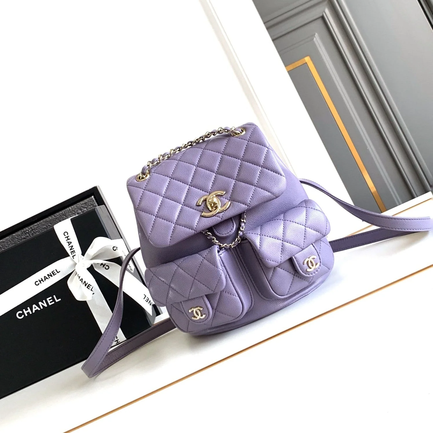 CHANEL 25S BACKPACK 21 CM IN PURPLE LAMBSKIN
