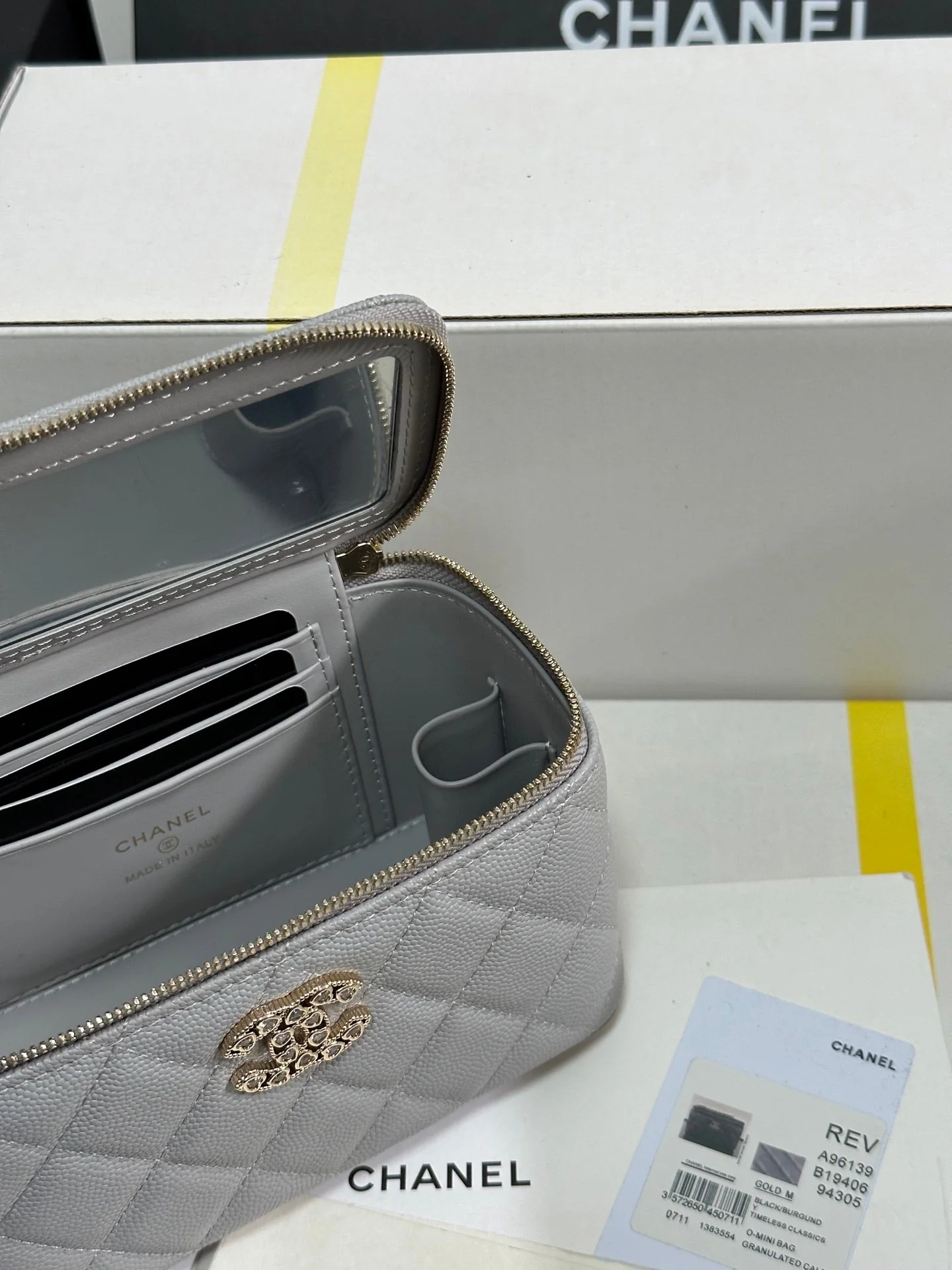 VANITY CASE 17 CRYSTAL STUDDED LOGO IN GREY CALFSKIN GOLD HARDWARE