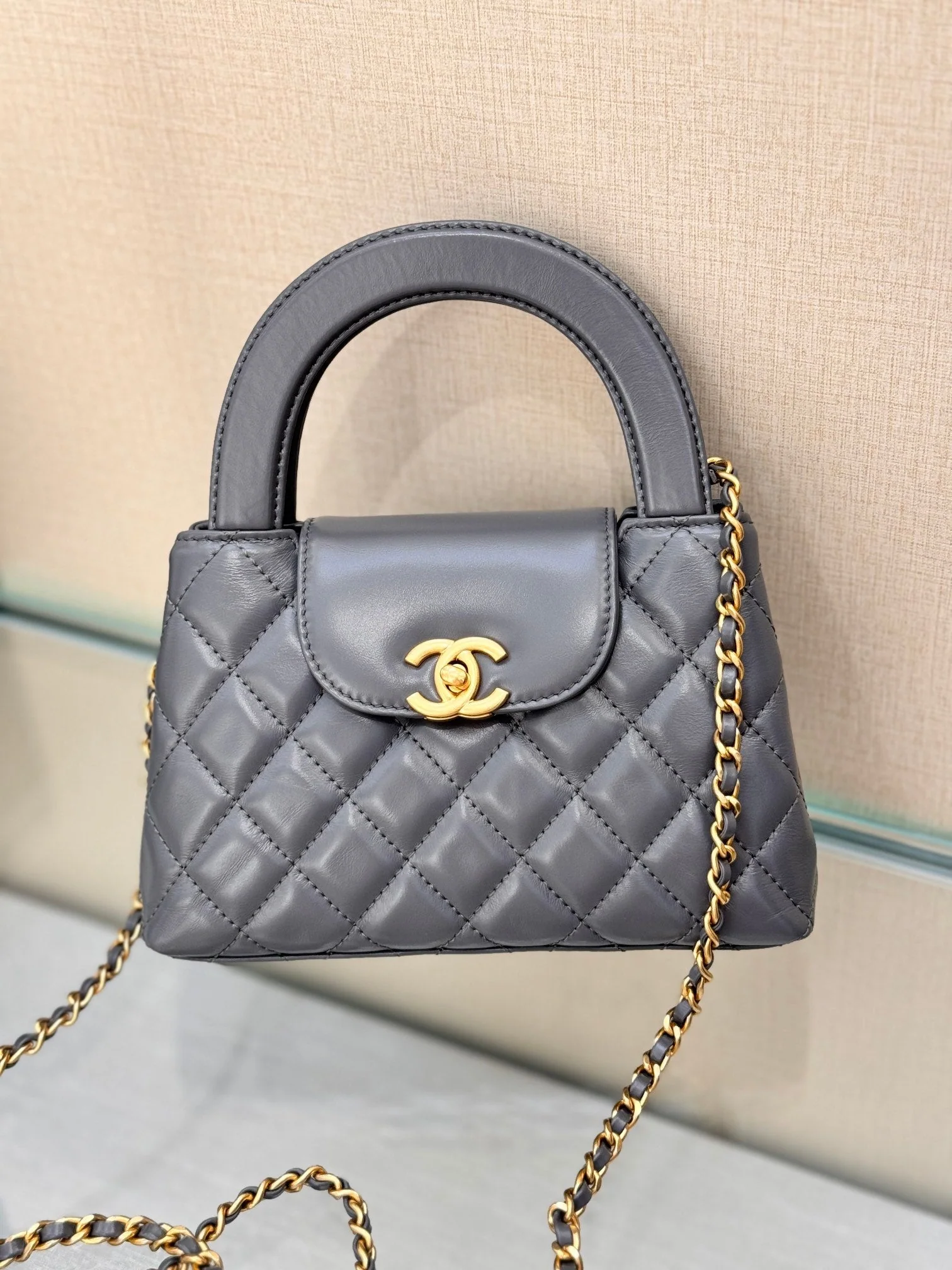 CHANEL 25S KELLY 19 CM IN DARK GREY LAMBSKIN WITH GOLD HARDWARE