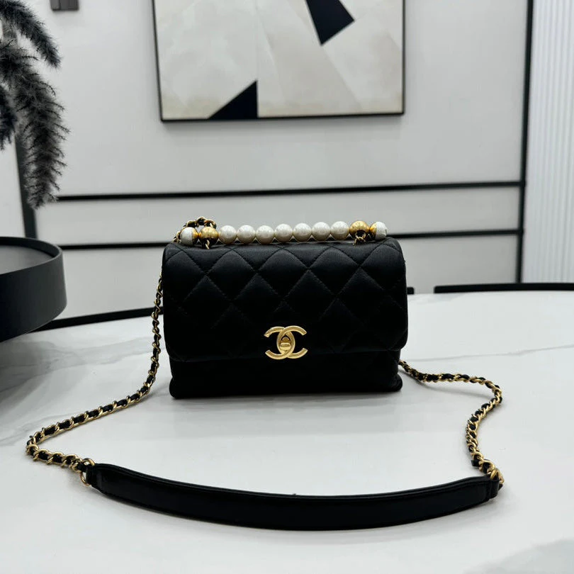CHANEL 25S FLAP BAG 19 CM IN BLACK LAMBSKIN WITH PEARL TOP HANDLE