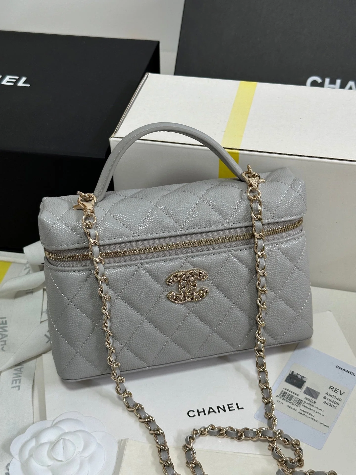 STRASS VANITY QUILTED CASE 19 IN GREY CALFSKIN WITH GOLD METALLIC