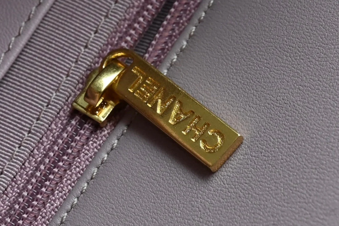 CHANEL 25S FLAP BAG 21 CM IN LIGHT PURPLE LAMBSKIN WITH GOLD HARDWARE