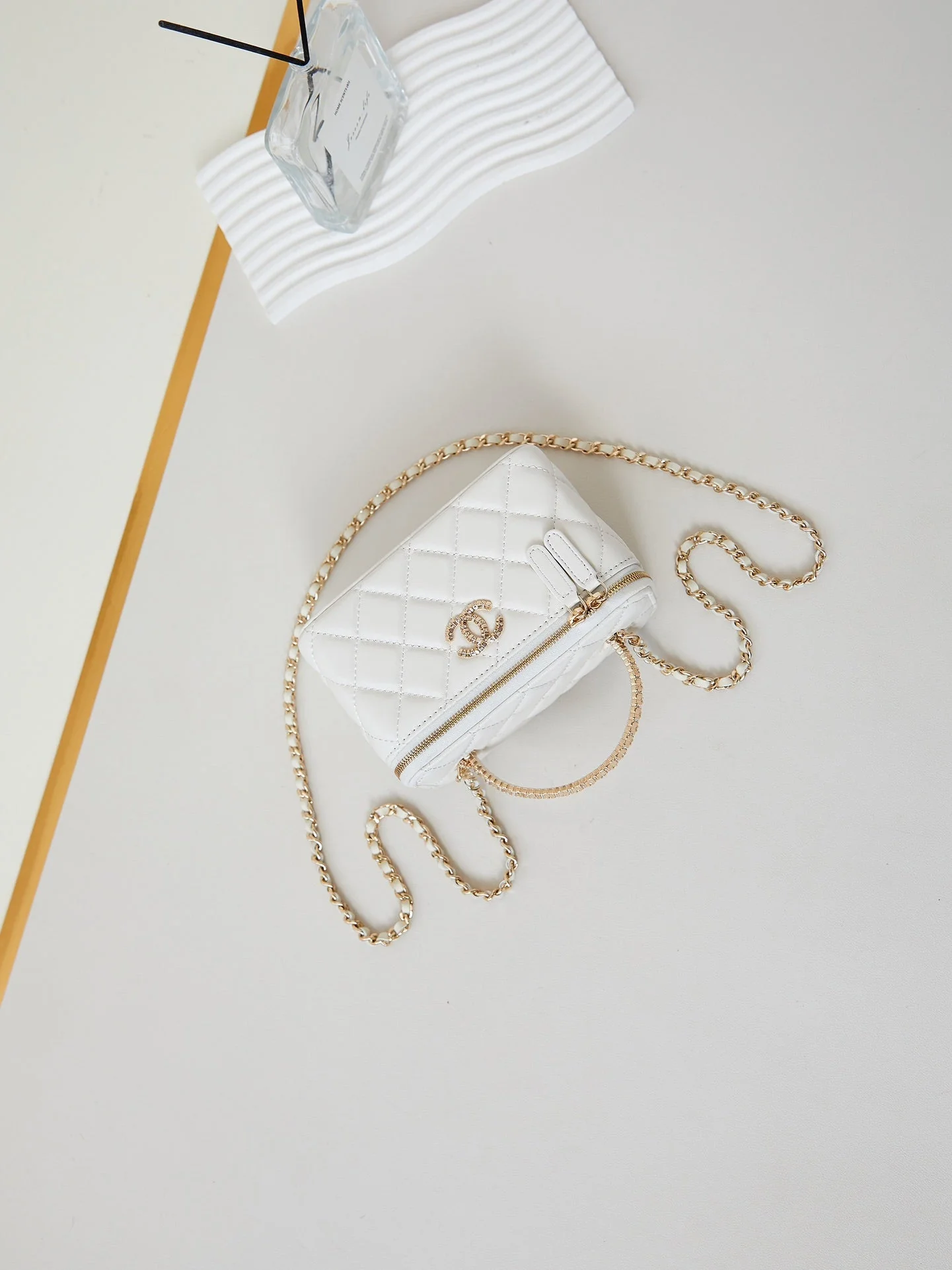 CHANEL 25S MINI VANITY BAG 16 CM IN WHITE LAMBSKIN WITH CRYSTAL-EMBELLISHED CC LOGO