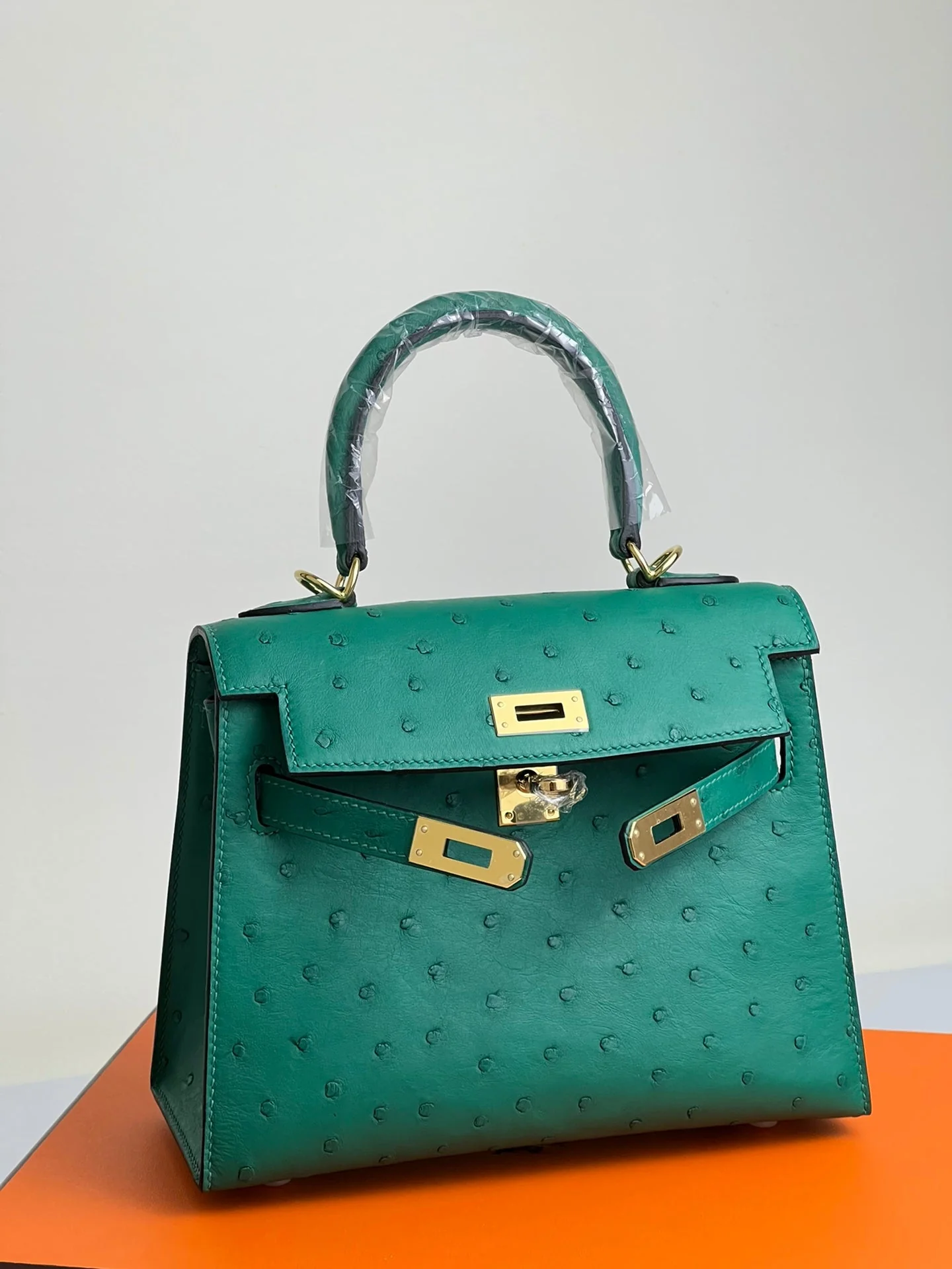 KELLY BAG 20 IN TEAL GREEN OSTRICH LEATHER WITH GOLD HARDWARE