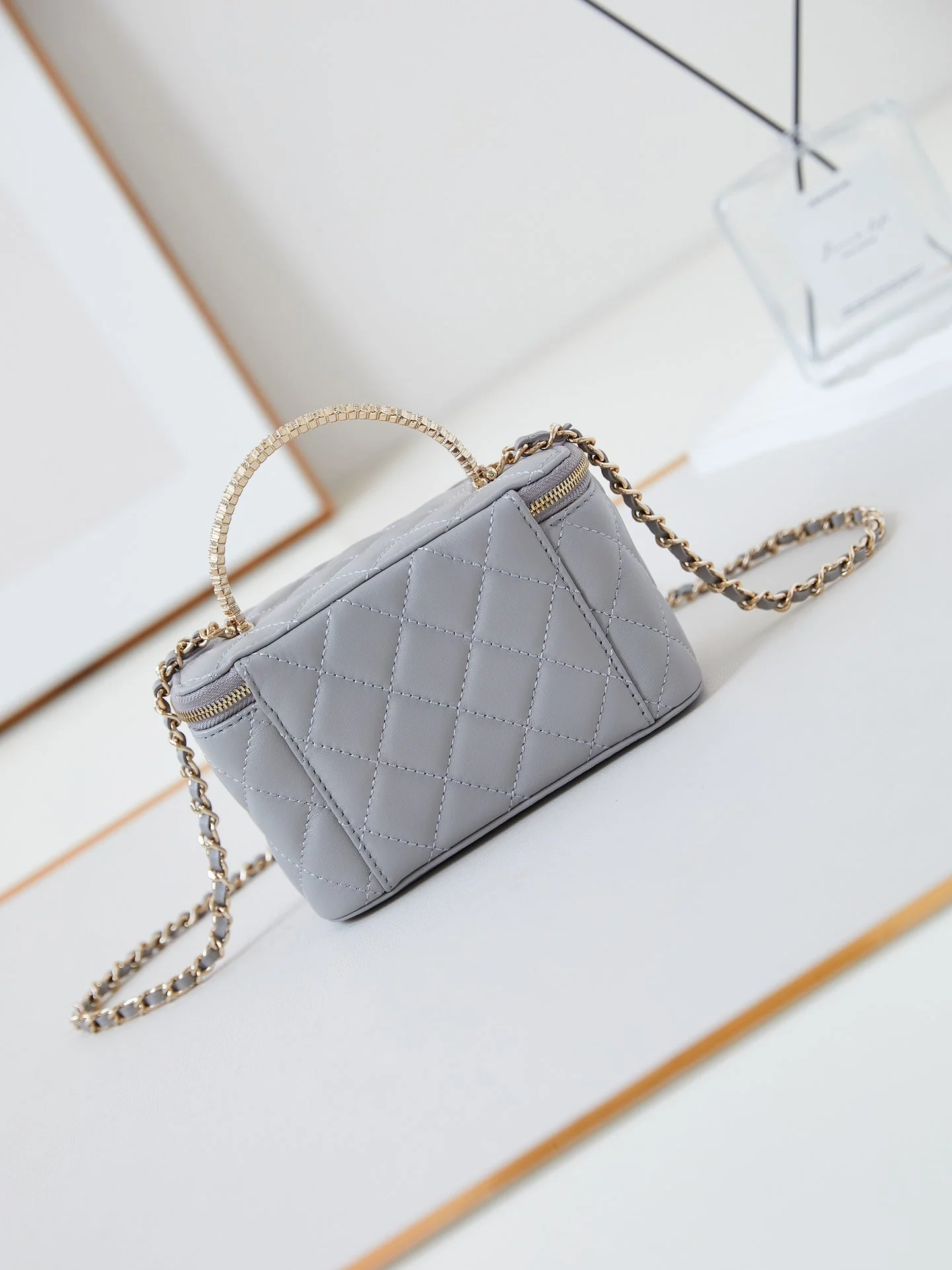CHANEL 25S MINI VANITY BAG 16 CM IN GREY LAMBSKIN WITH CRYSTAL-EMBELLISHED CC LOGO