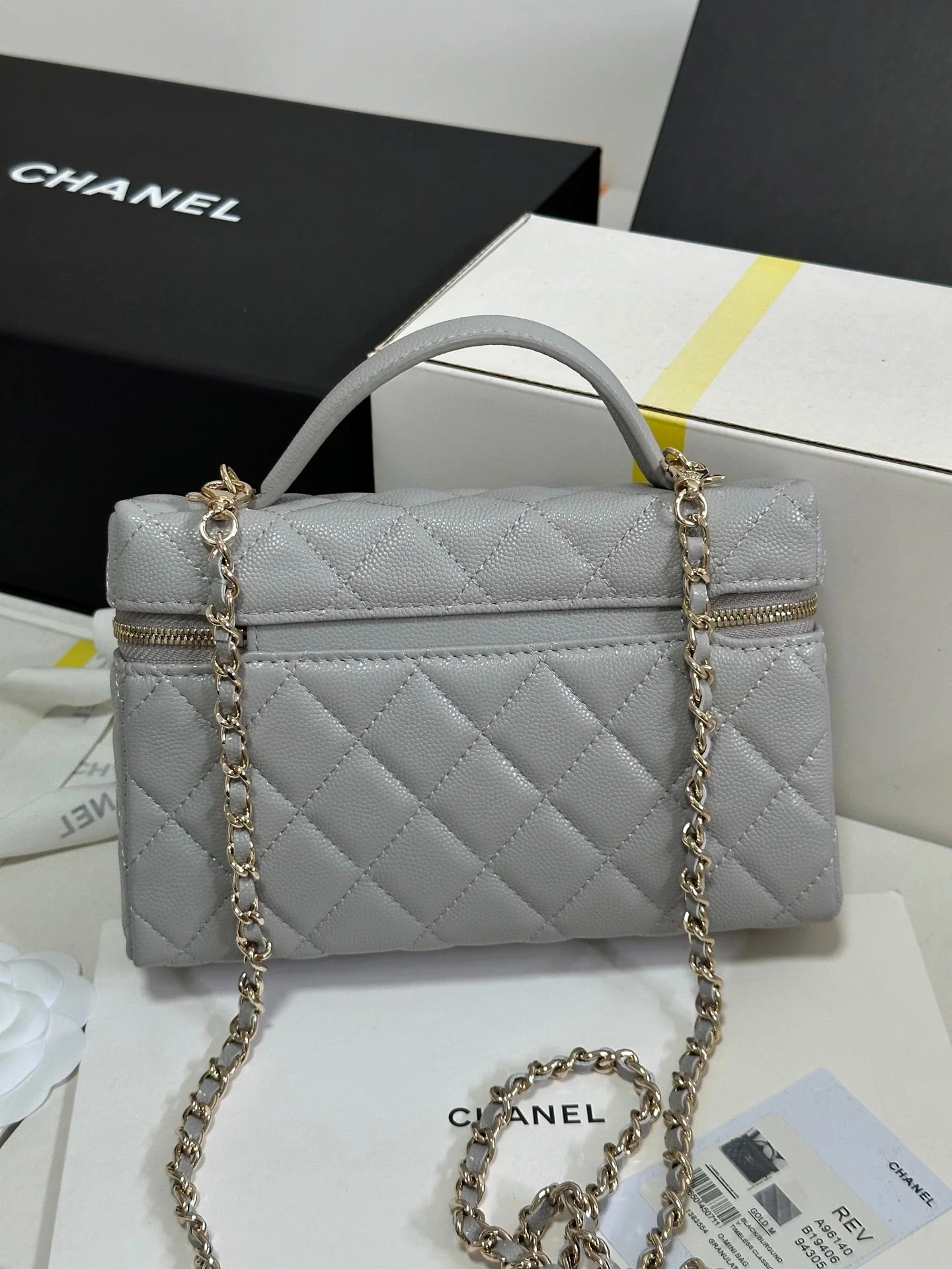 STRASS VANITY QUILTED CASE 19 IN GREY CALFSKIN WITH GOLD METALLIC