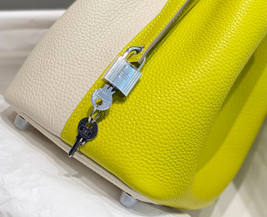 HERMES 25S PICOTIN LOCK 18 IN WHITE AND LEMON YELLOW CALFSKIN SILVER HARDWARE