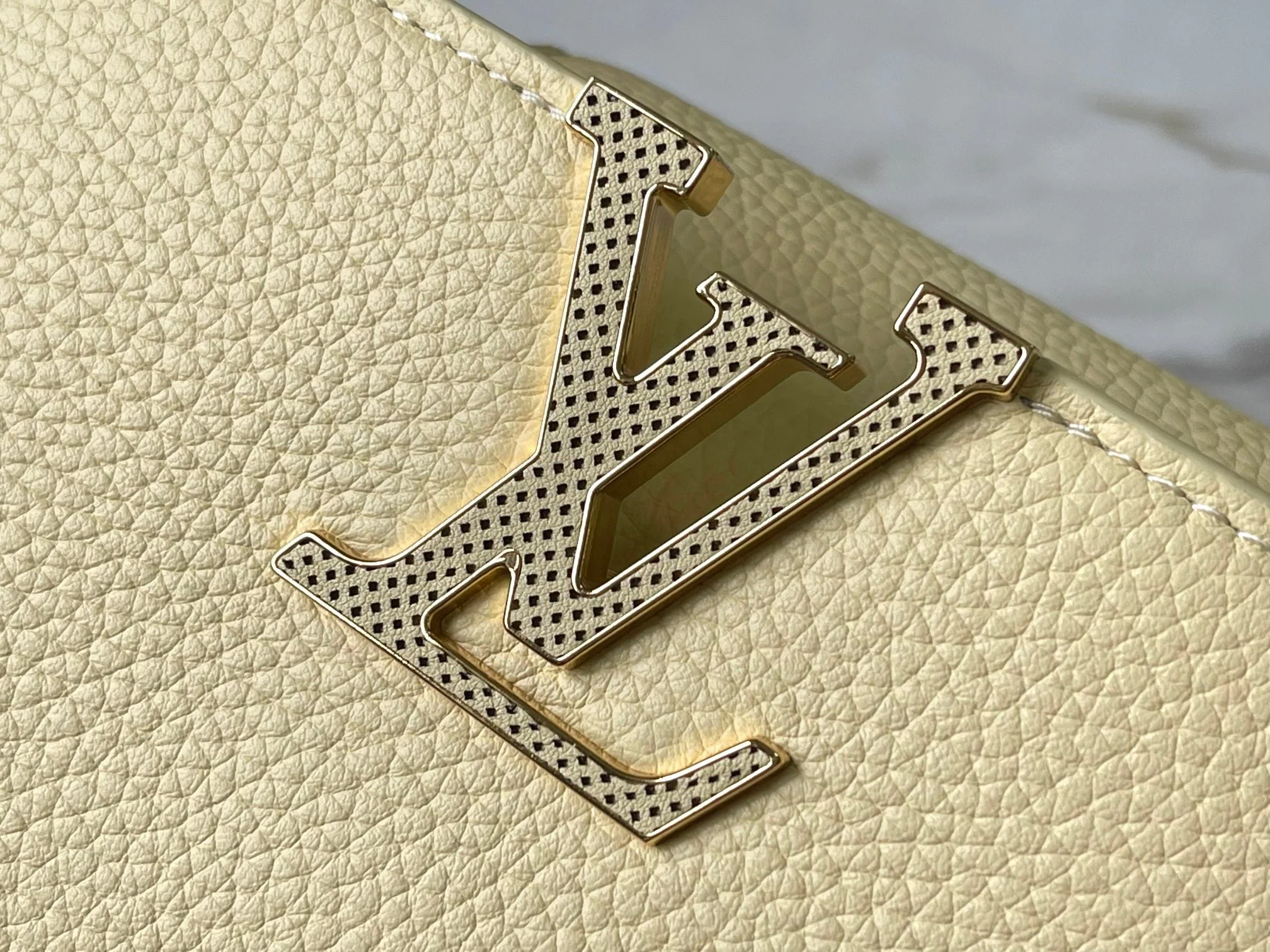 CAPUCINES EAST-WEST MINI 22 IN BANANA YELLOW TAURILLON GOLD HARDWARE