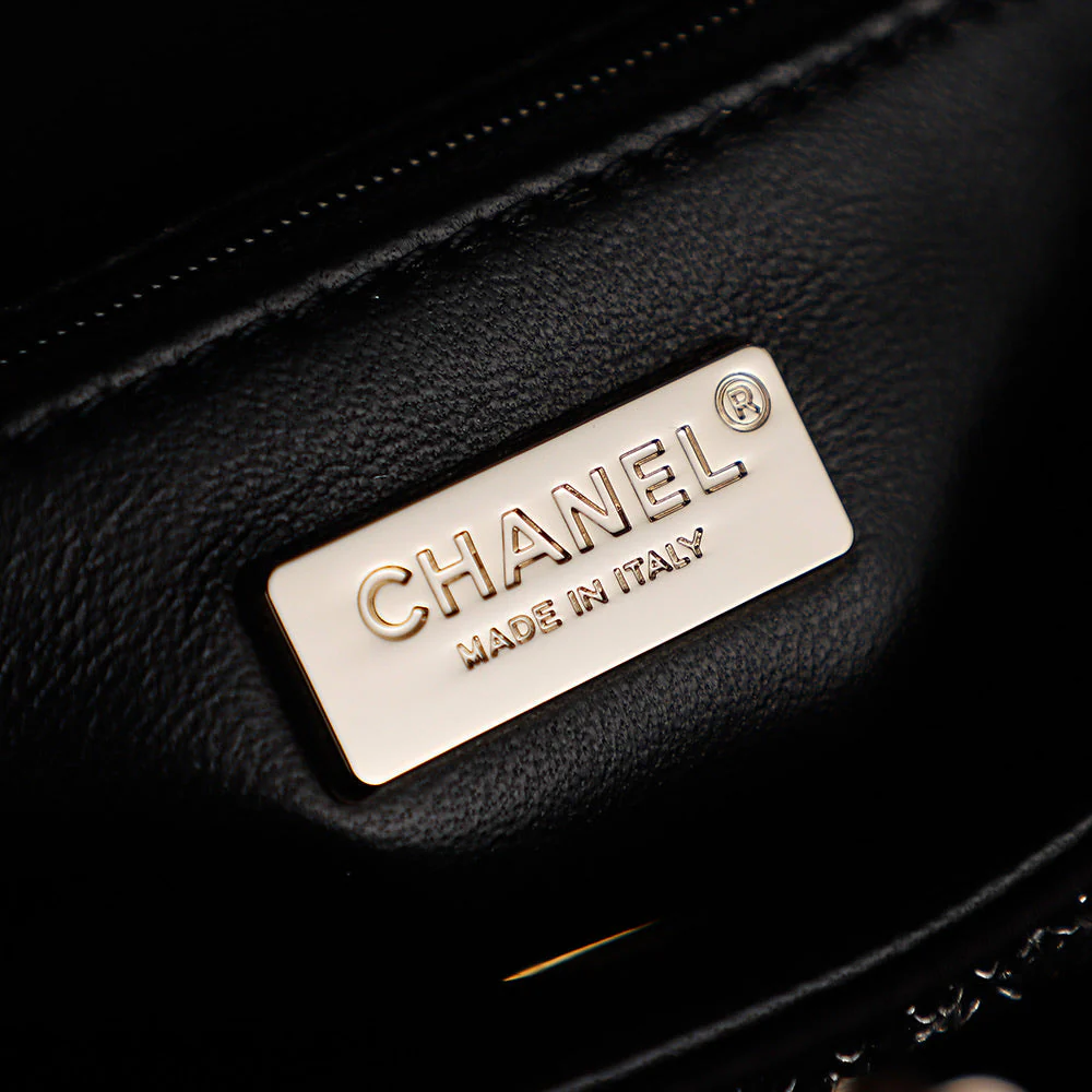 CHANEL 25S FLAP BAG 21 CM IN BLACK SEQUINED TWEED WITH GOLD HARDWARE
